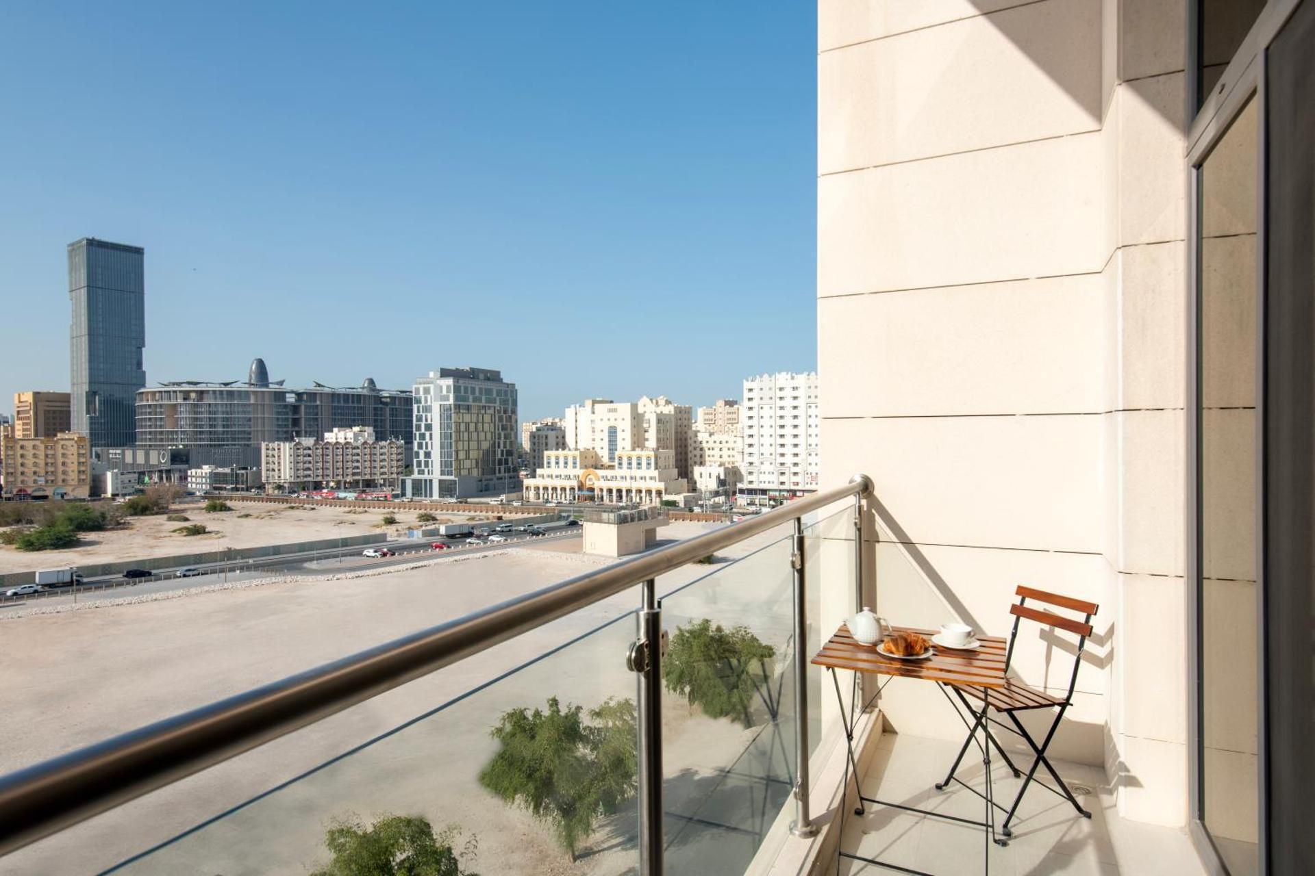Two-Bedroom Duplex Apartment with Balcony and City View