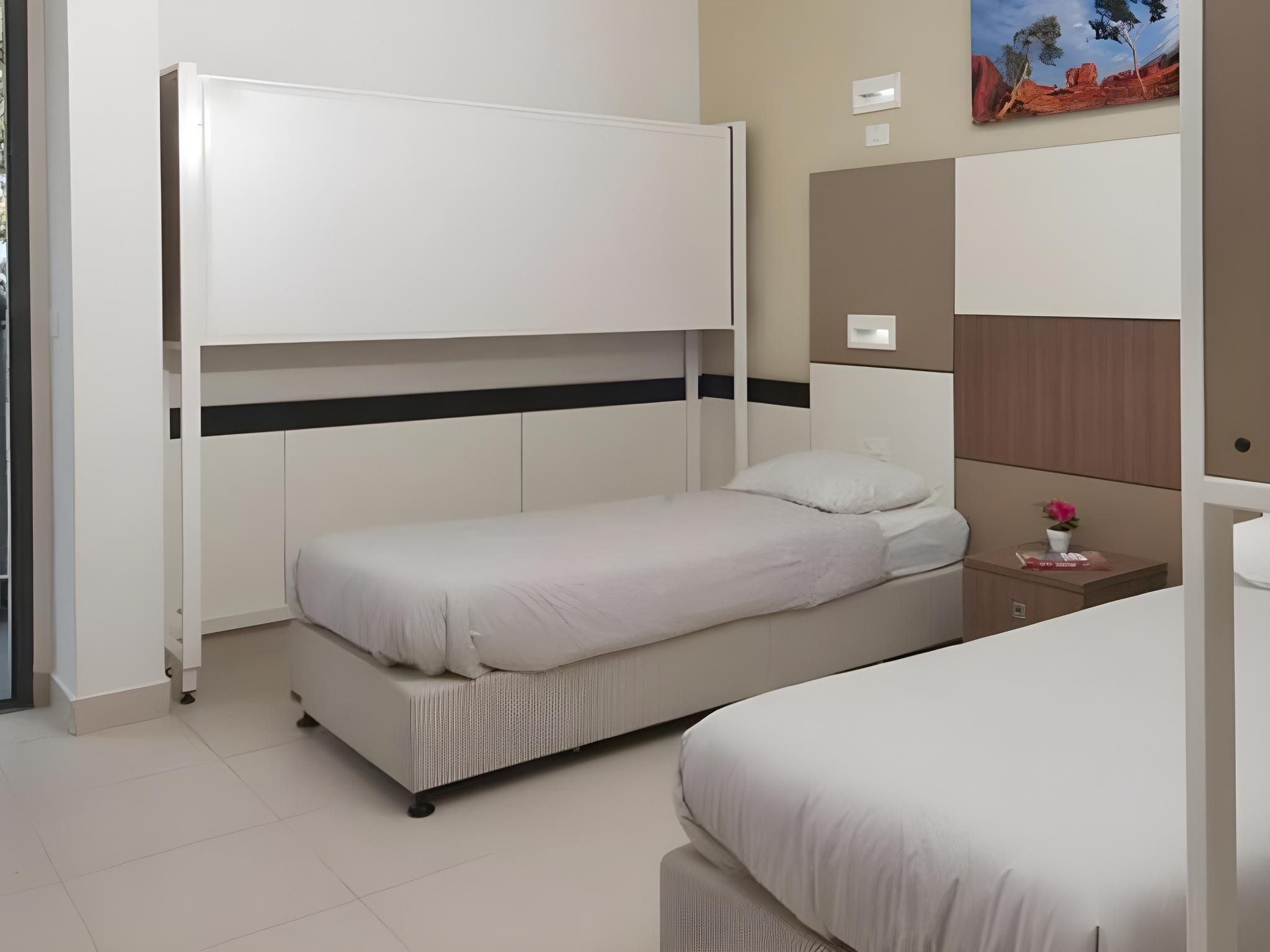 Single Bed in Female Dormitory Room
