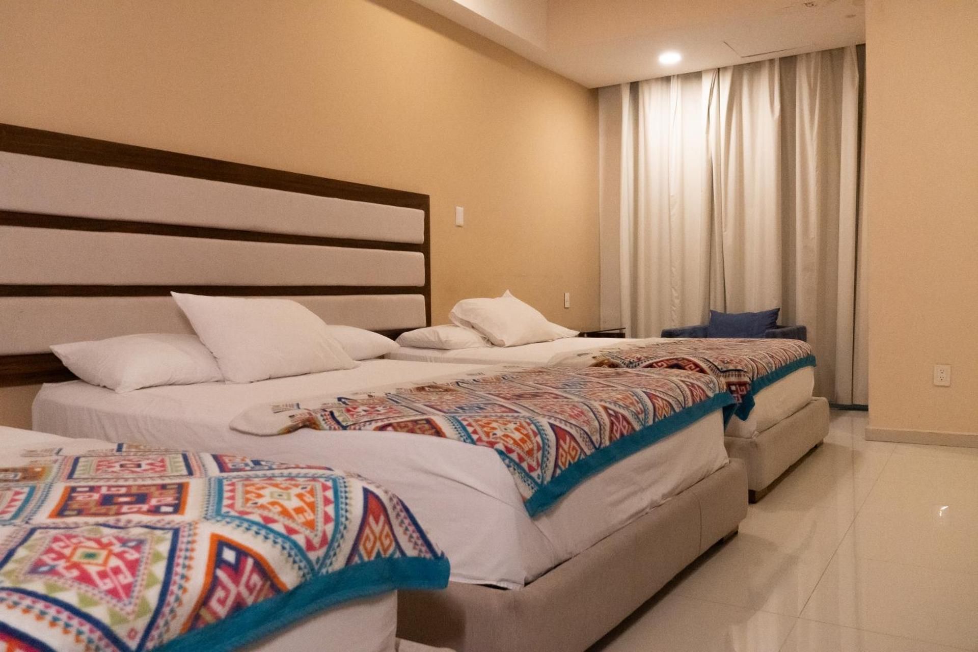 Infinity Suites triple room 211