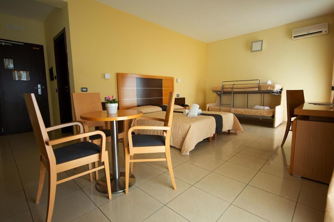 Ticho's Greenblu Hotel Standard Quad 2