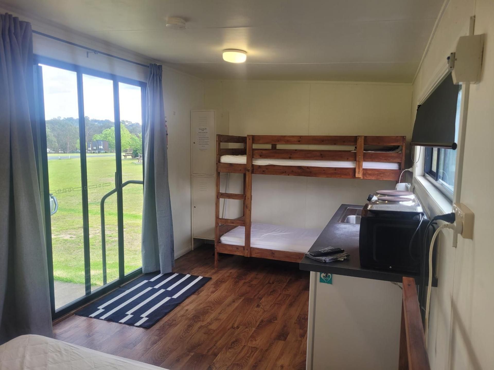 Non-Ensuite Wood Cabins (Bunk and Queen Beds)