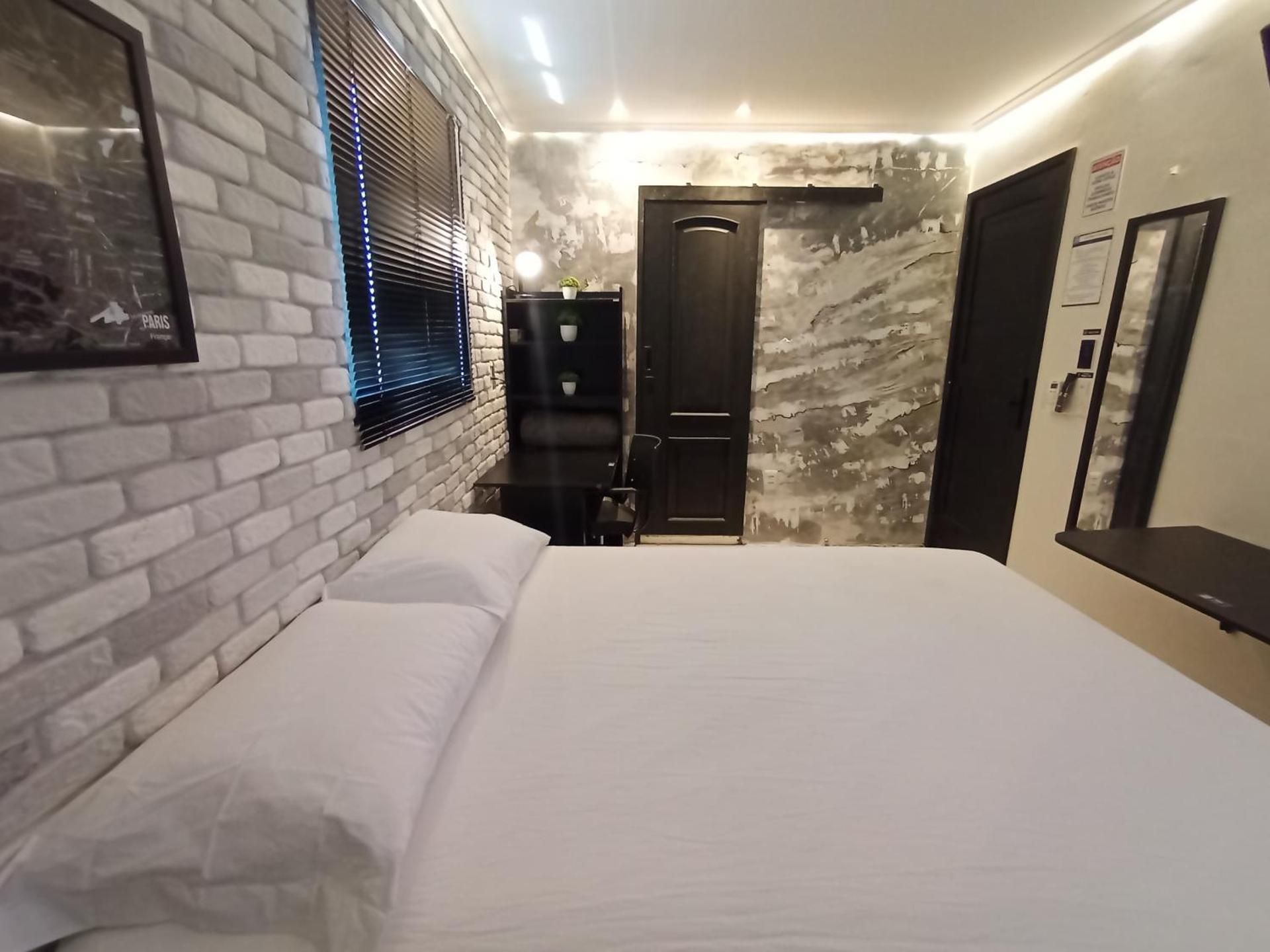 Quadruple Room with Private Bathroom