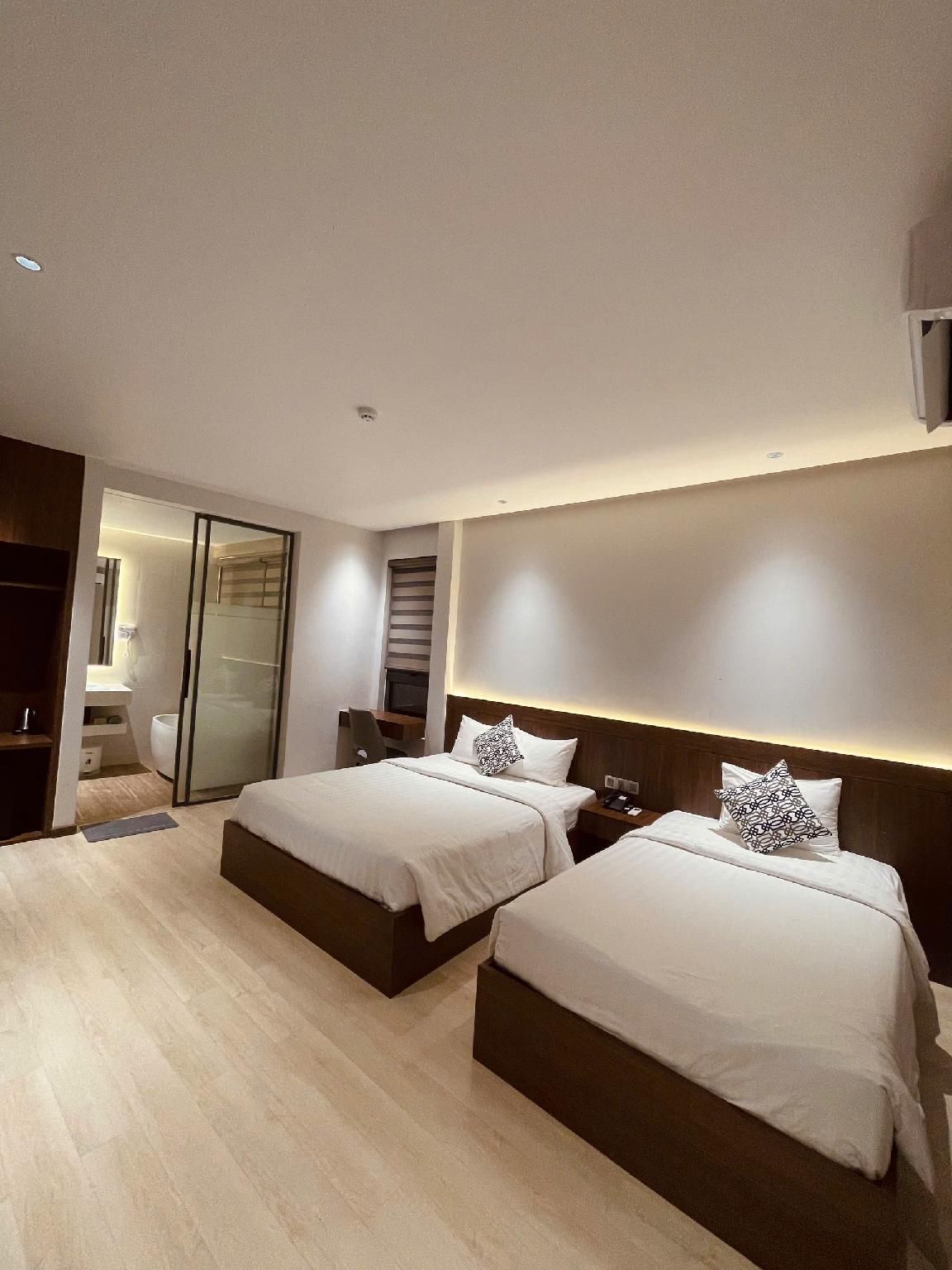 Deluxe Quad Room