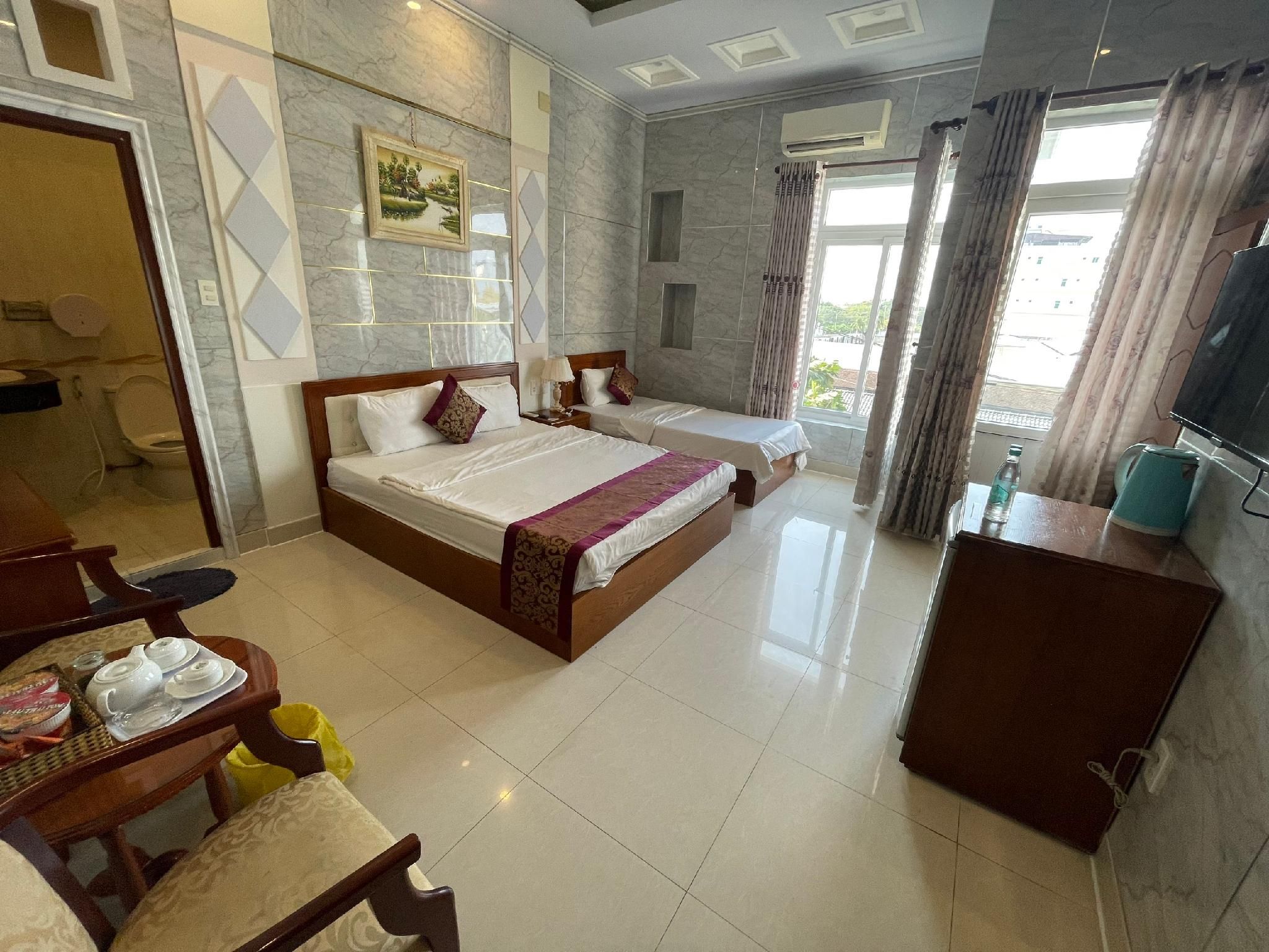 Deluxe Triple Room