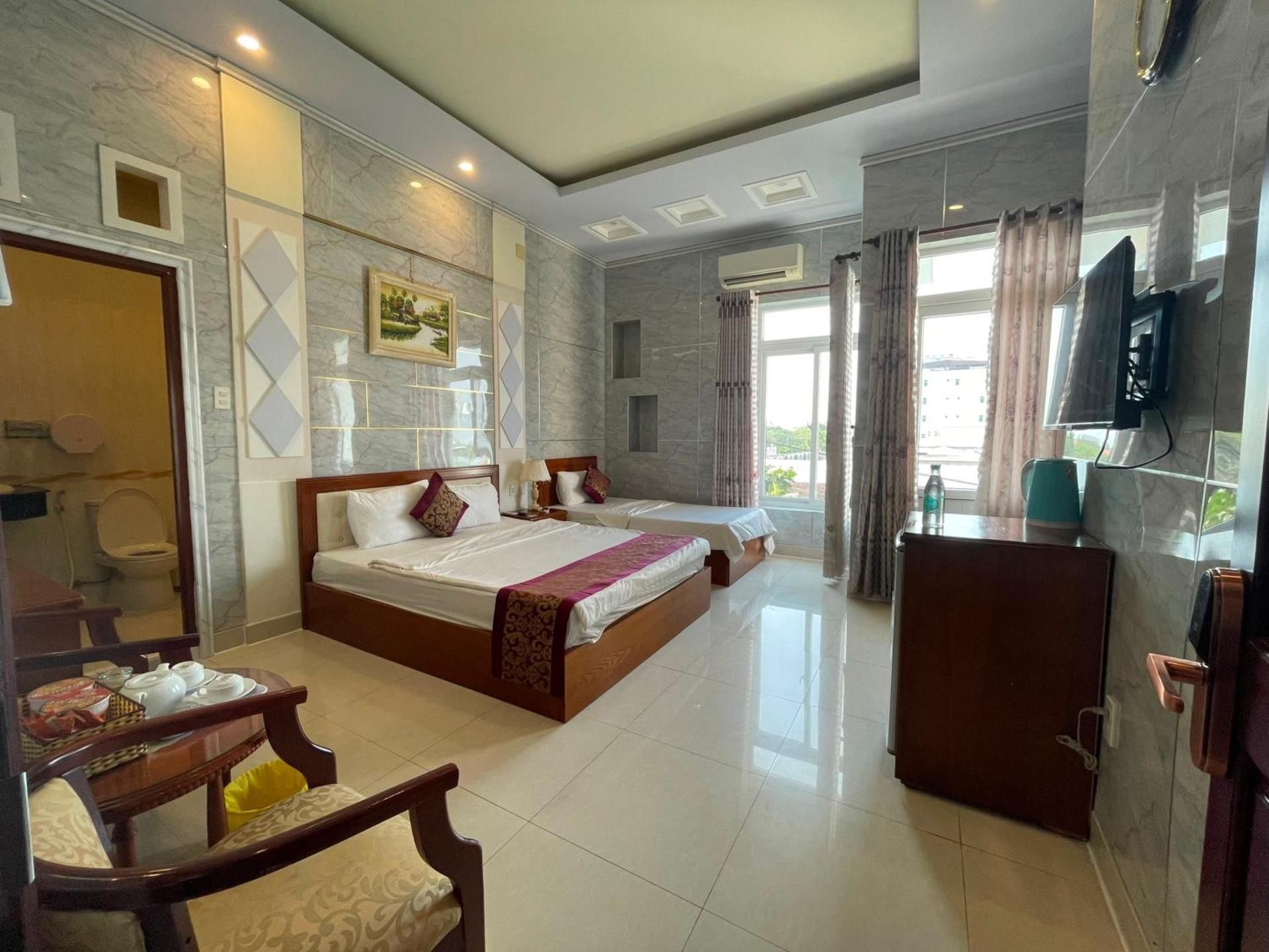 Deluxe Triple Room