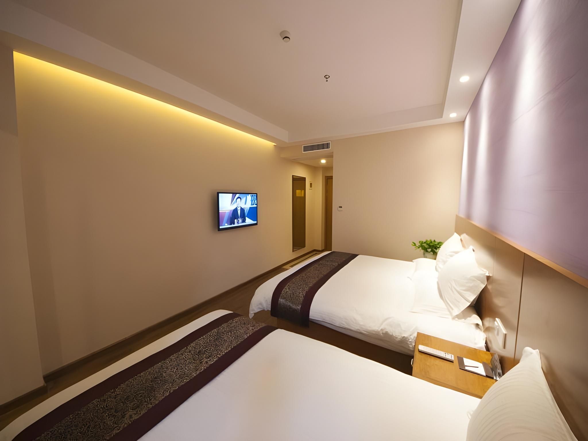 GreenTree Inn Taizhou JingJiang Zhongzhou Road Sunshine international business hotel Family Room 2