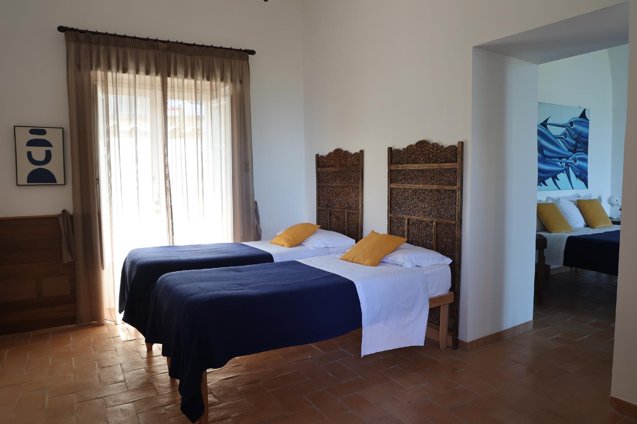 Quadrupla-Classica-Bagno in camera-Vista spiaggia