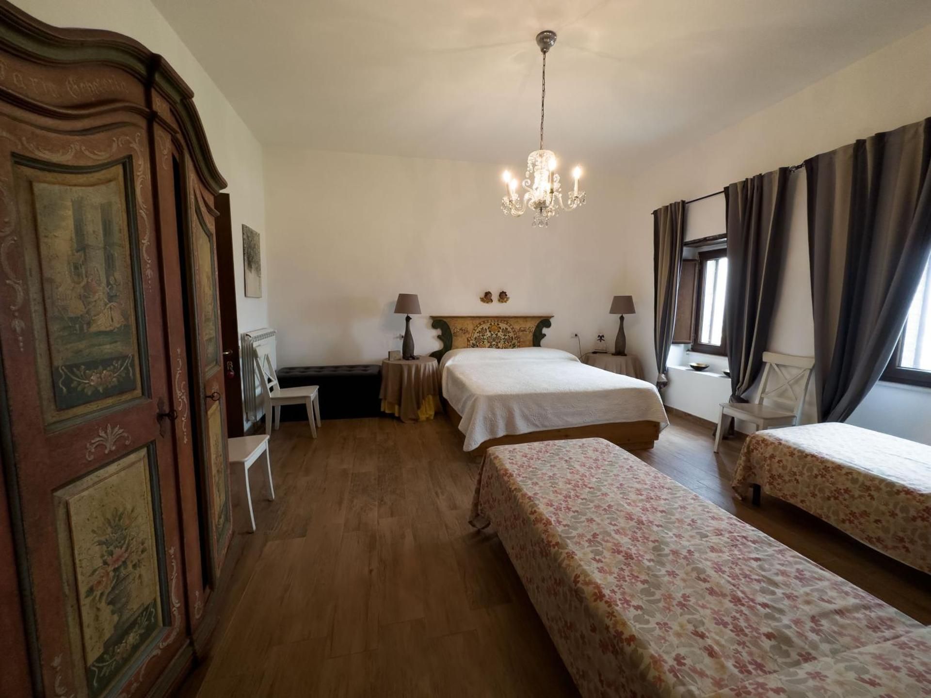 Quadruple Room with Private Bathroom