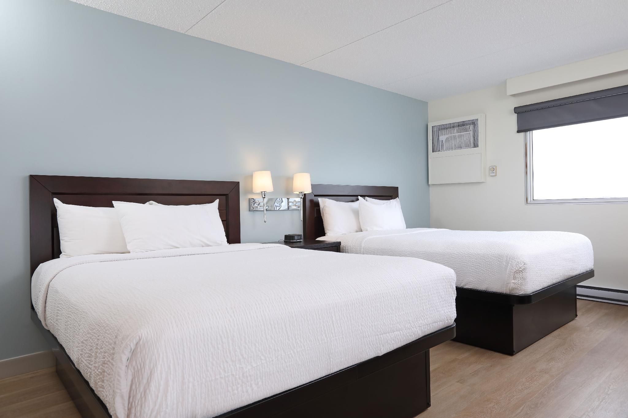 Deluxe Two Queen Room