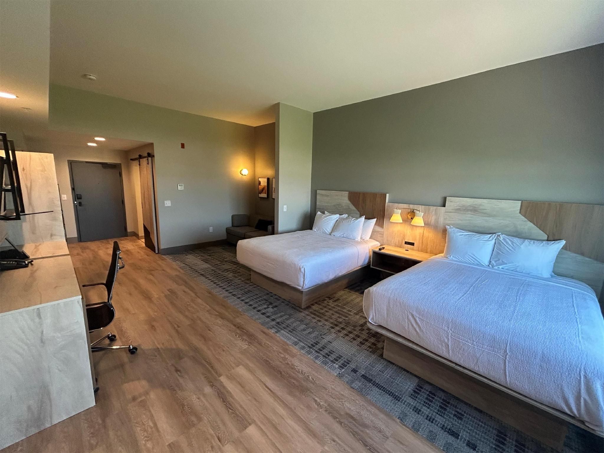 Suite-2 Queen Beds, Non-Smoking, Kitchenette, Sitting Area, Wi-Fi, Shower Only