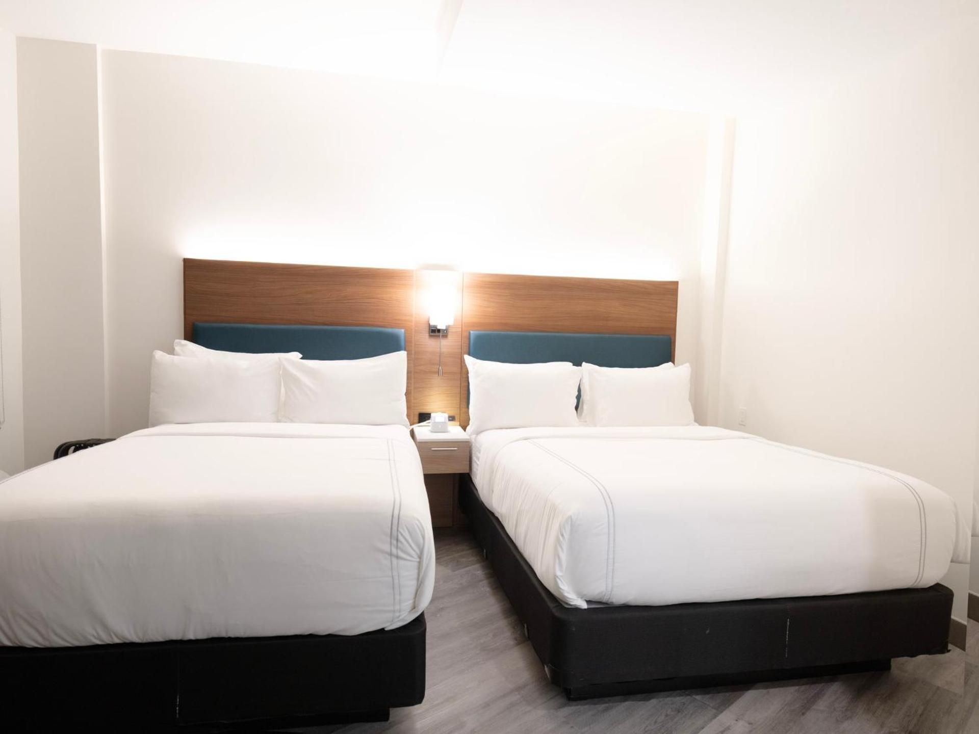 Premium Room with One Queen Bed and One Full Bed