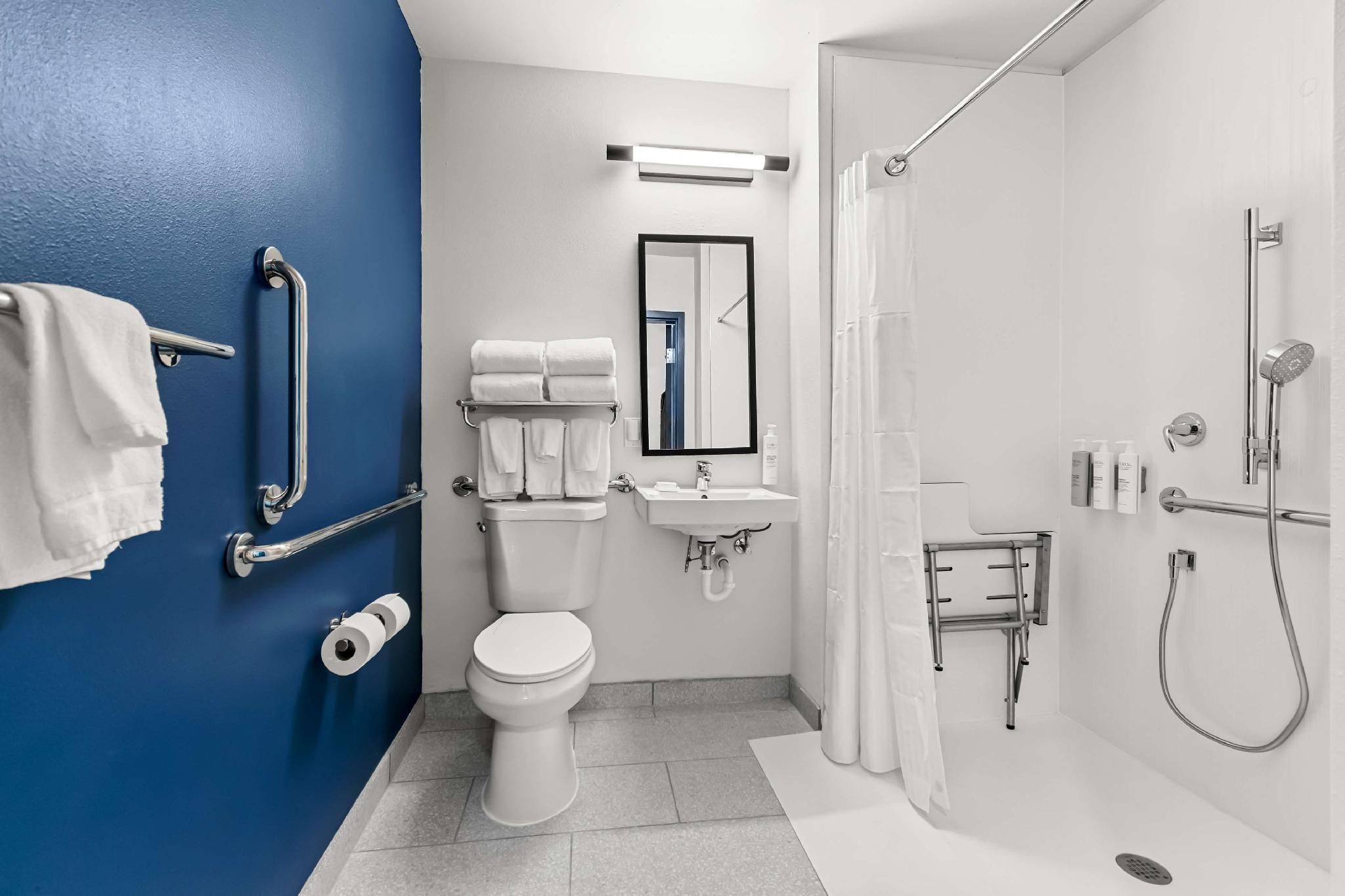 1 KING MOBILITY ACCESSIBLE ROLL IN SHOWER