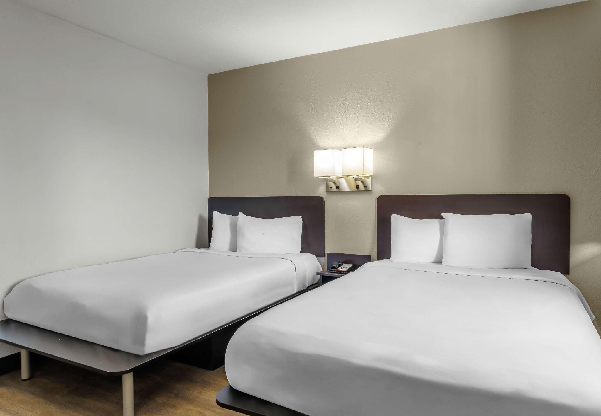 2 Full Beds | ADA/Roll-In Shower