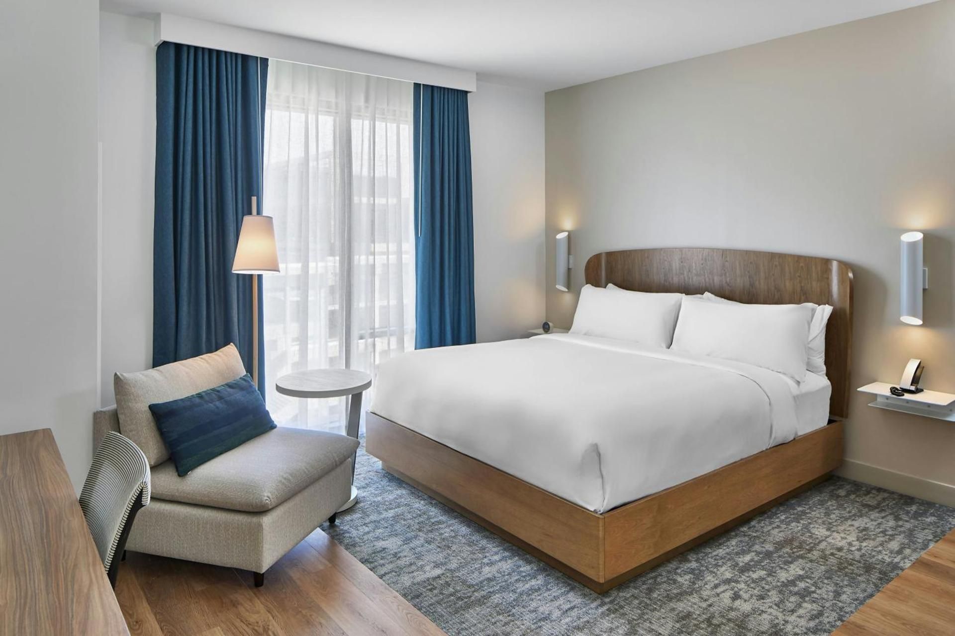 Studio King Room with Sofa Bed - Mobility/Hearing Accessible with Roll-In Shower
