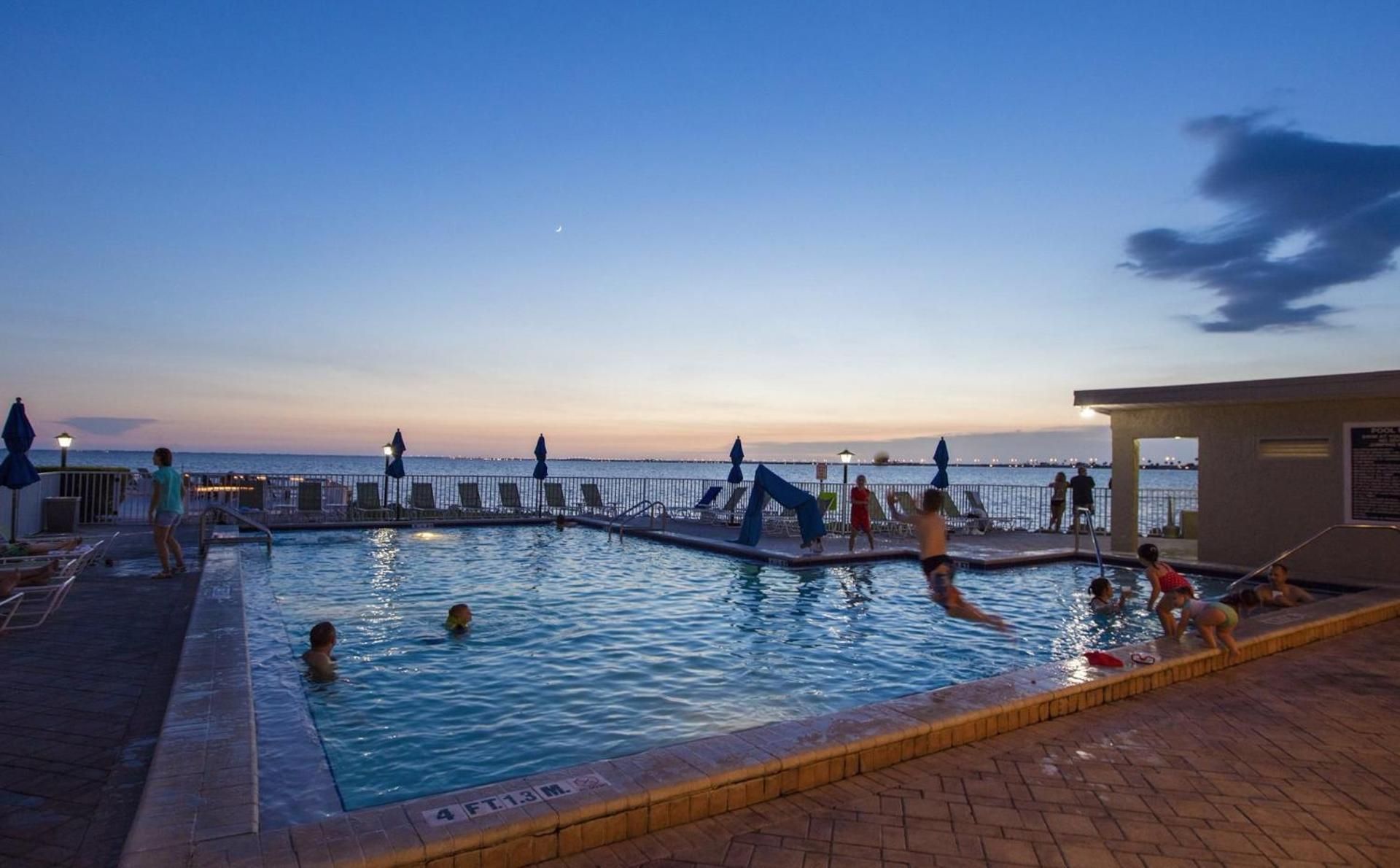 2 Bed Condo with Balcony Facing Pool and Sunsets!