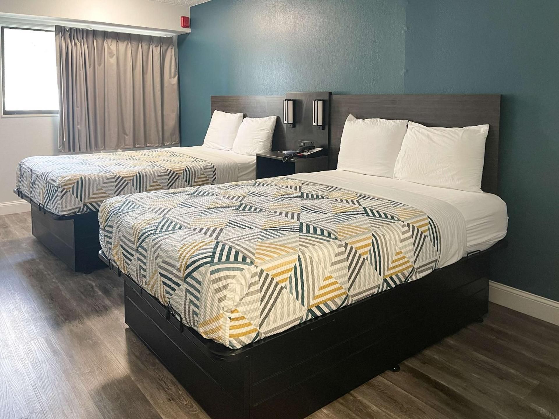 2 Full Beds | ADA/Roll-In Shower