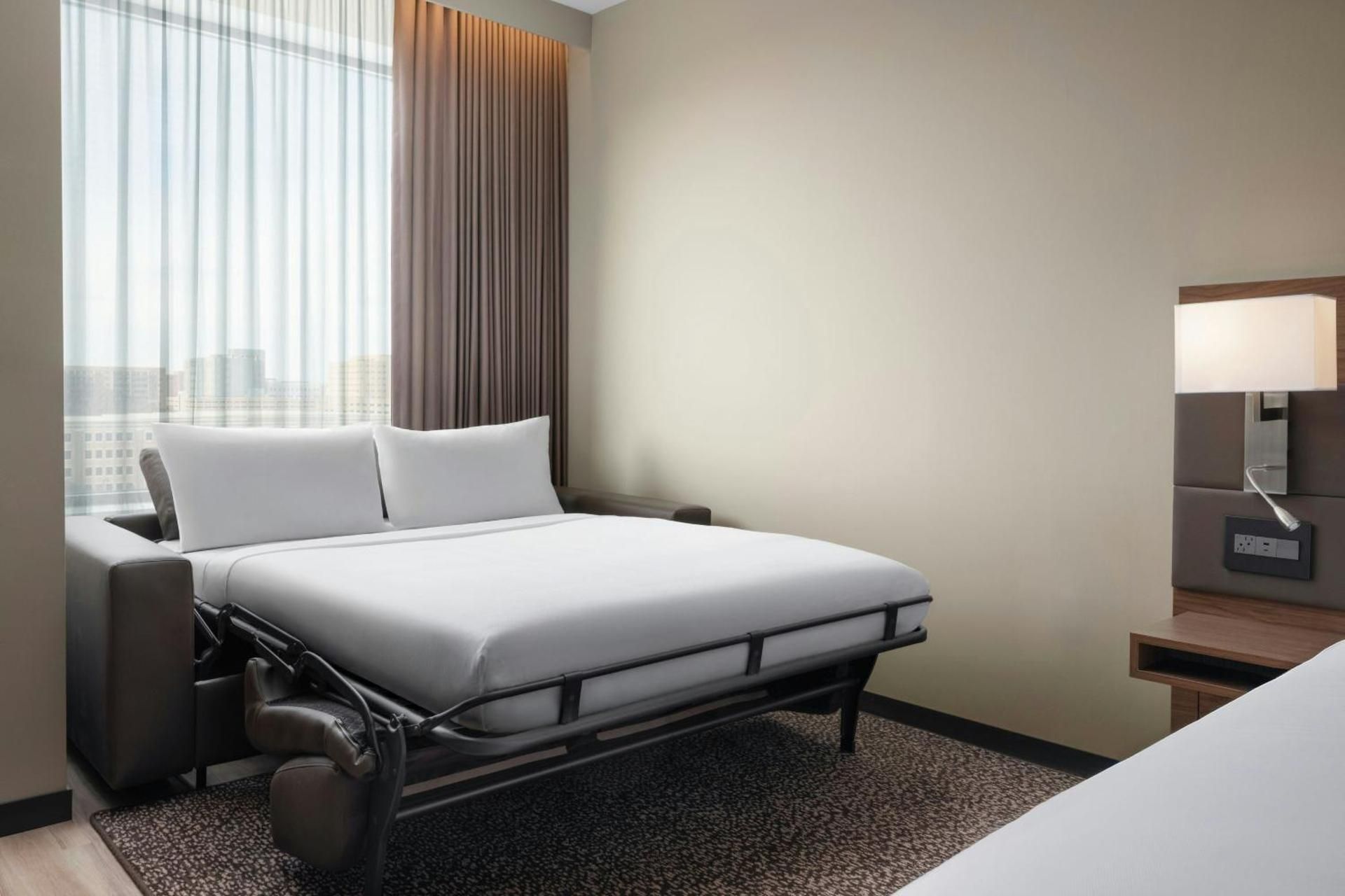Deluxe King Room with Sofa Bed and City View