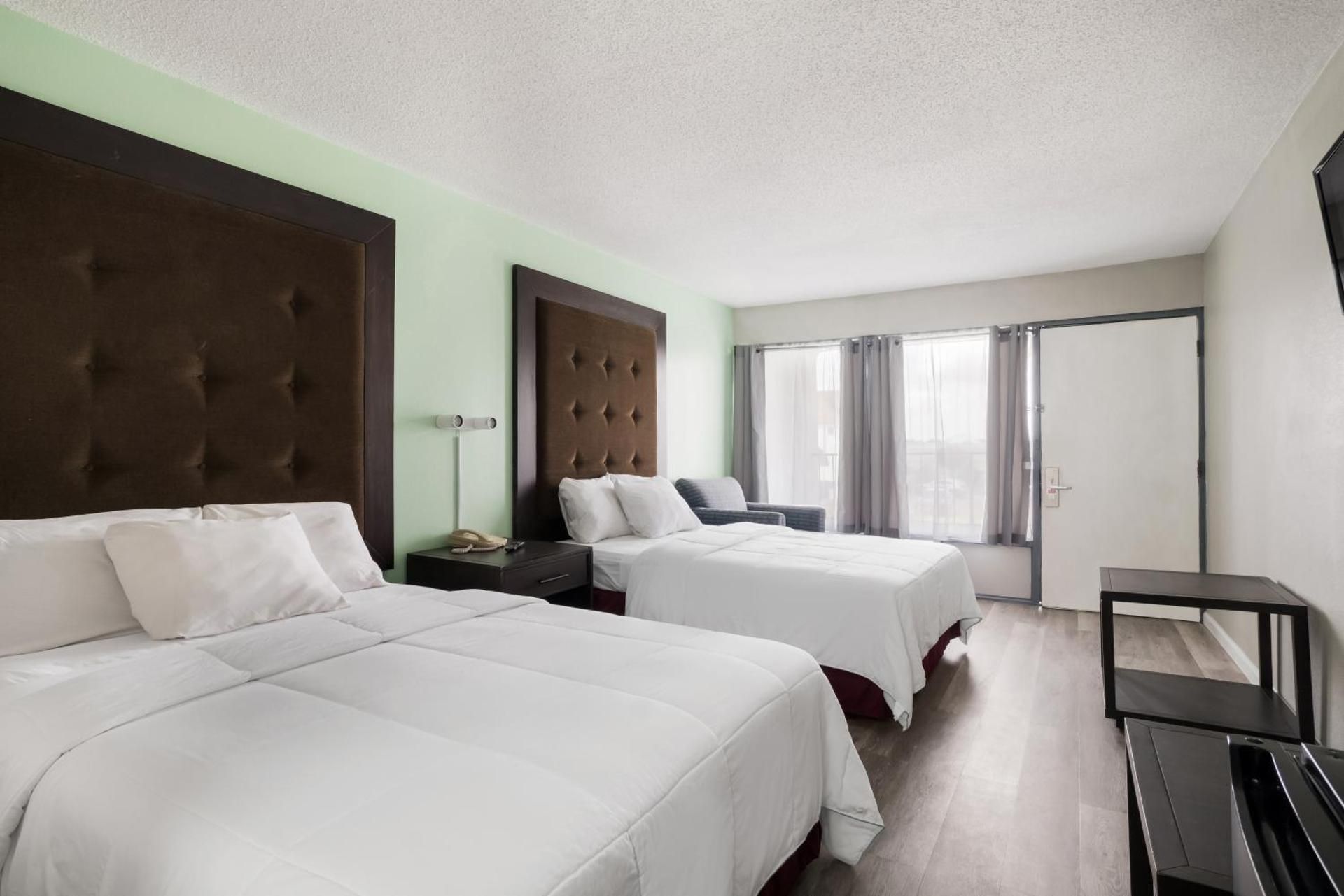 2 Double Beds Access Adjoin Suite Smoking