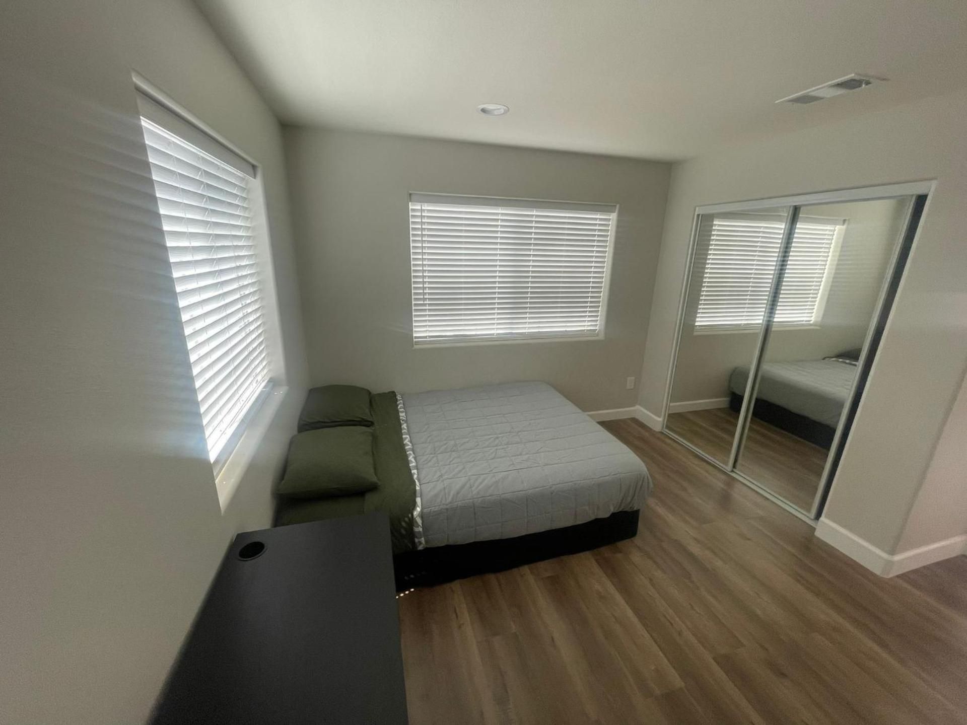 Queen Room with Shared Bathroom