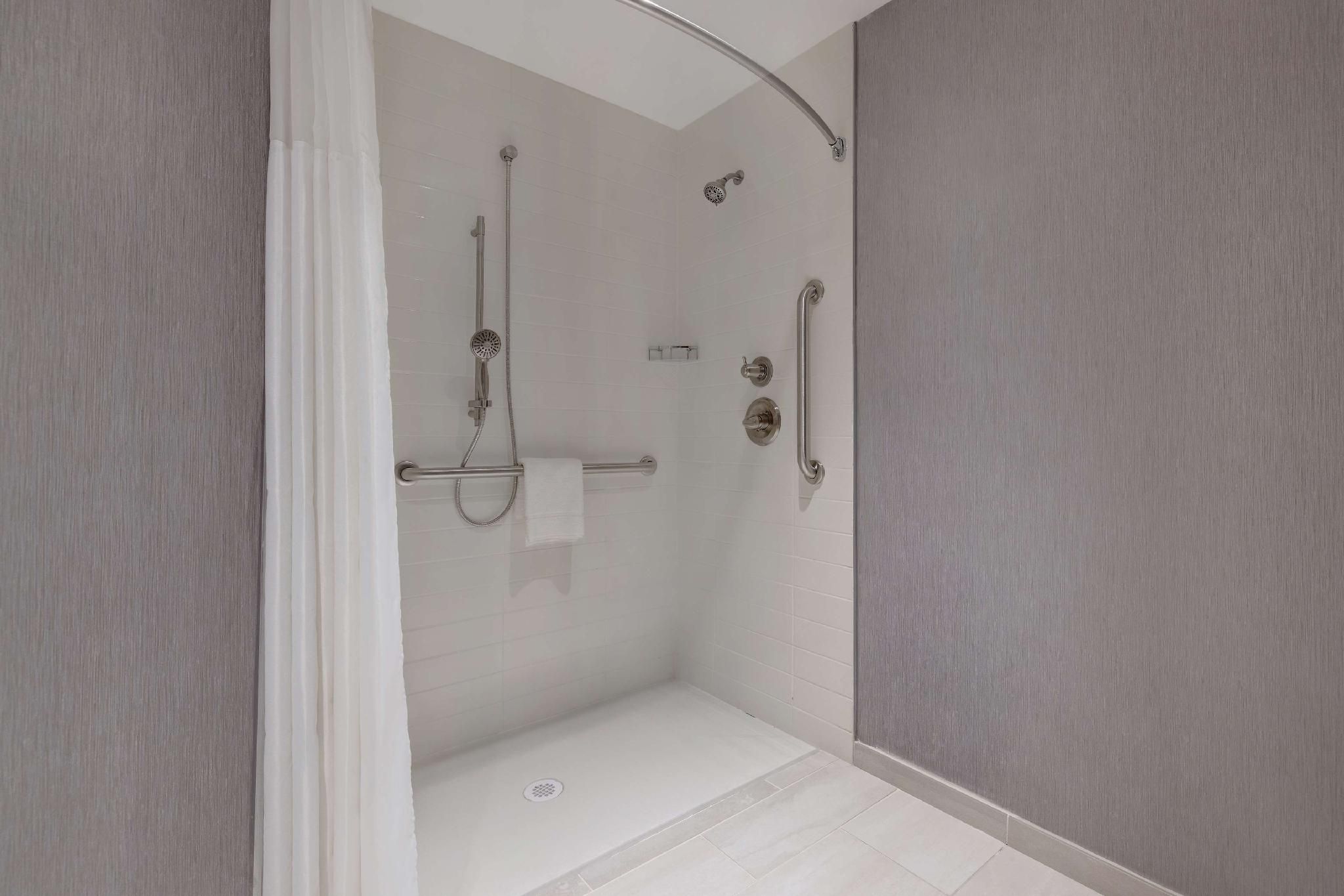 Accessible Two Queen Bedsrollin Shower (Plus Sofa Bed)
