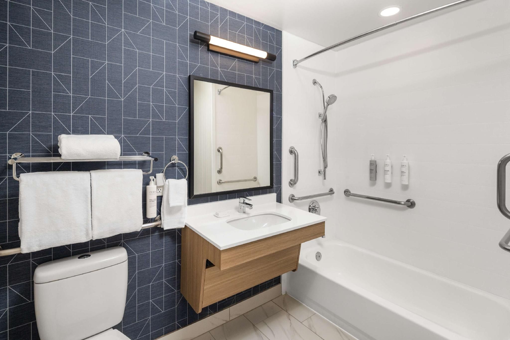 1 KING MOBILITY ACCESSIBLE ROLL IN SHOWER