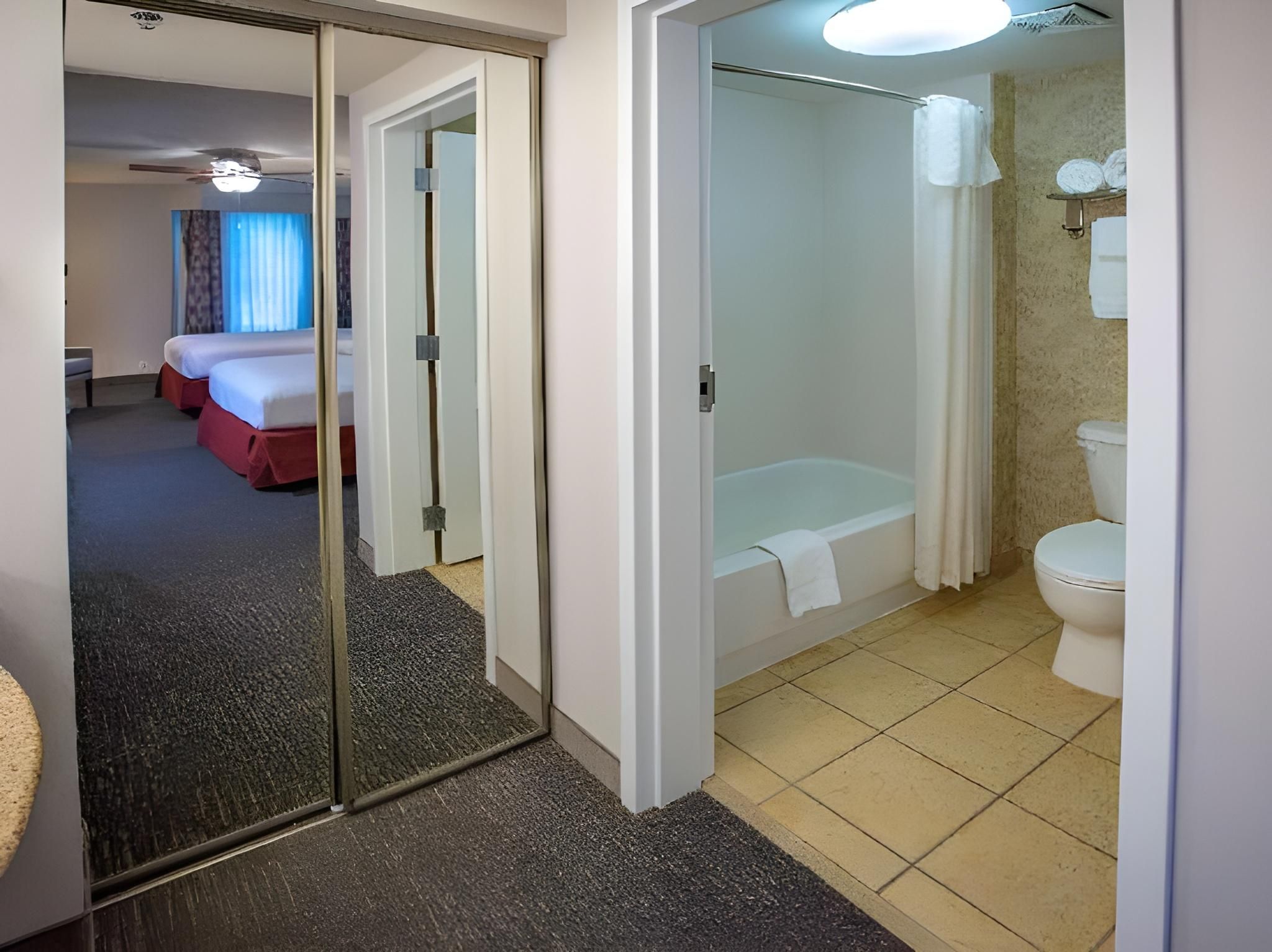 1 King And 2 Queen Two Bedroom Suite