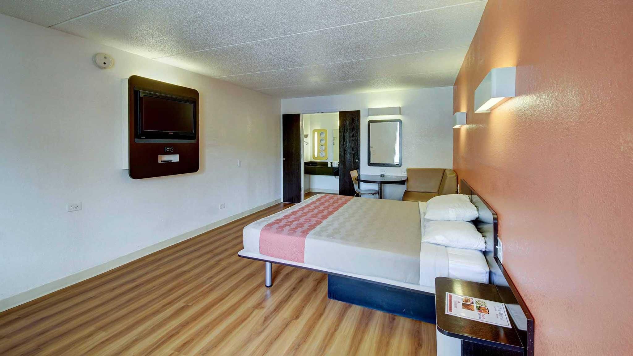 1 Queen Bed | Mini Fridge