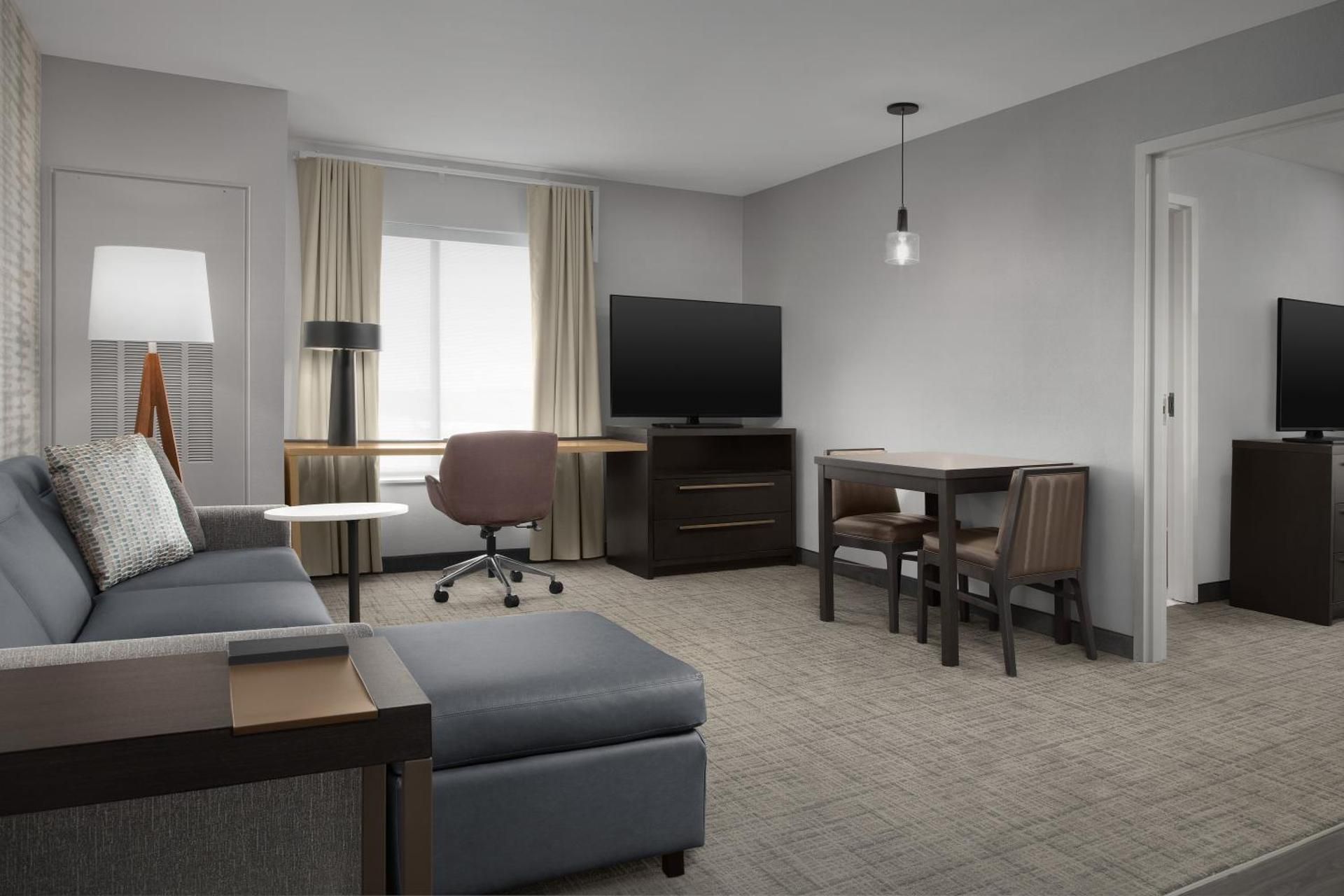 One-Bedroom King Suite with Sofa Bed and Roll-in Shower - Mobility and Hearing Accessible