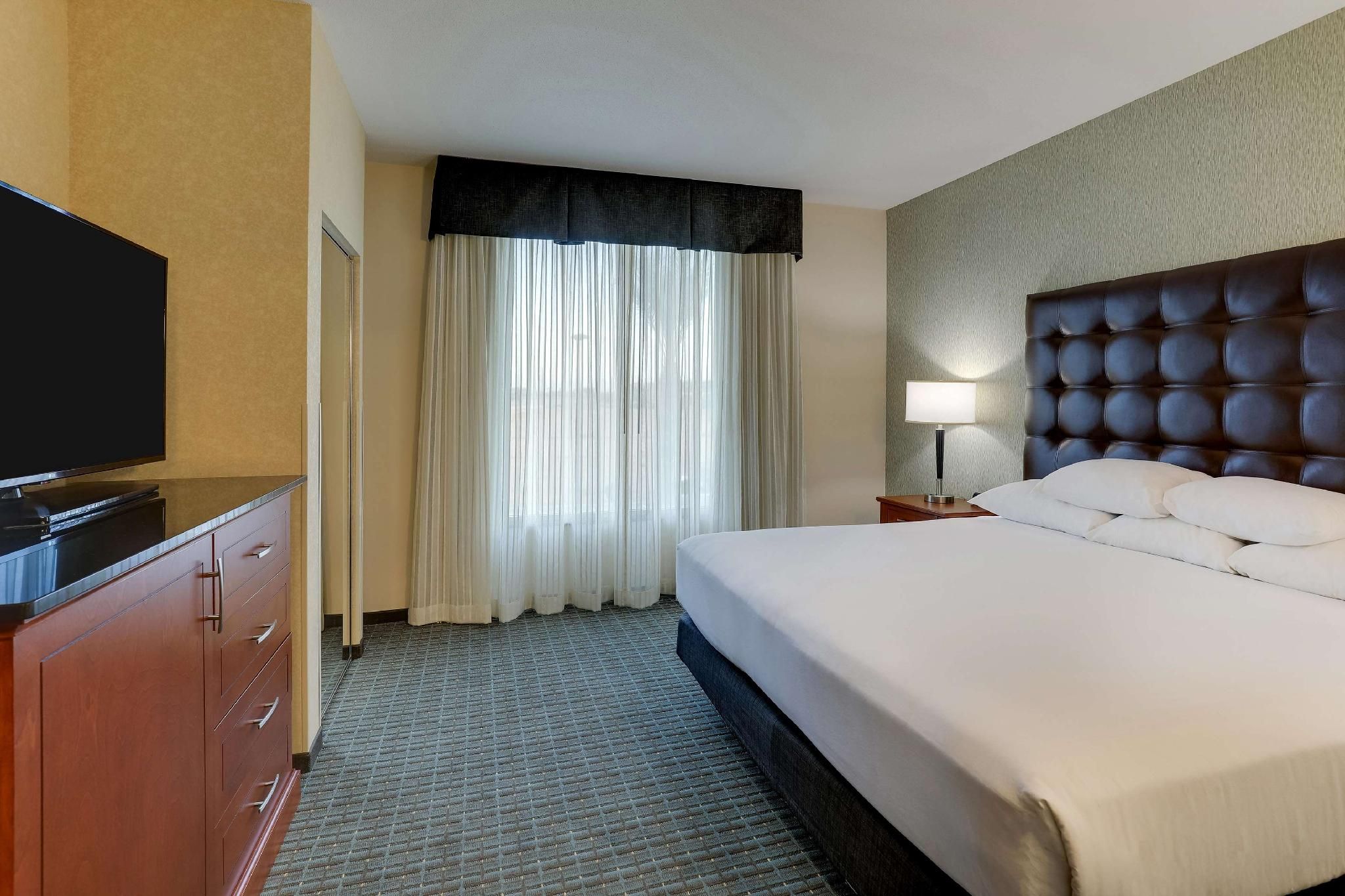 1 King Bed Meeting Suite, 2 Rooms with Sofa Sleeper, Hearing Accessible with Roll-in Shower