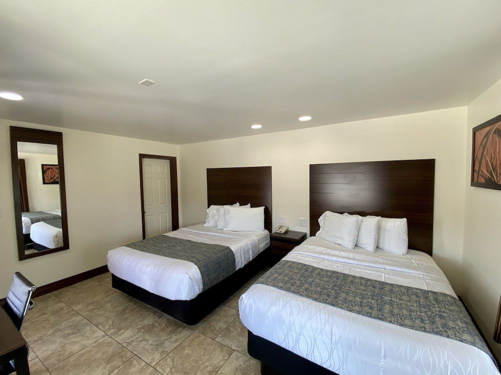 Roswell Inn Standard 2 Queen Pillow top Beds 3