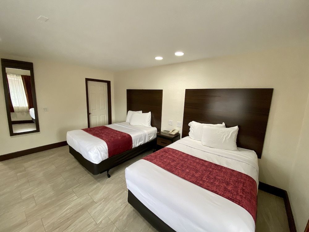 Roswell Inn Standard Room 2 Full Pillow top Beds 2