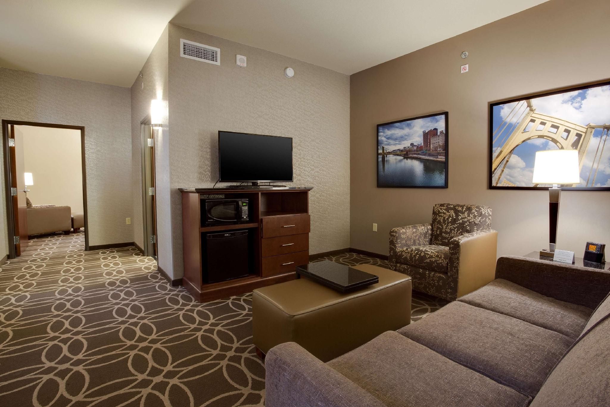 1 King Bed Suite, 2 Rooms with Sofa Sleeper, Hearing Accessible with Roll-In Shower