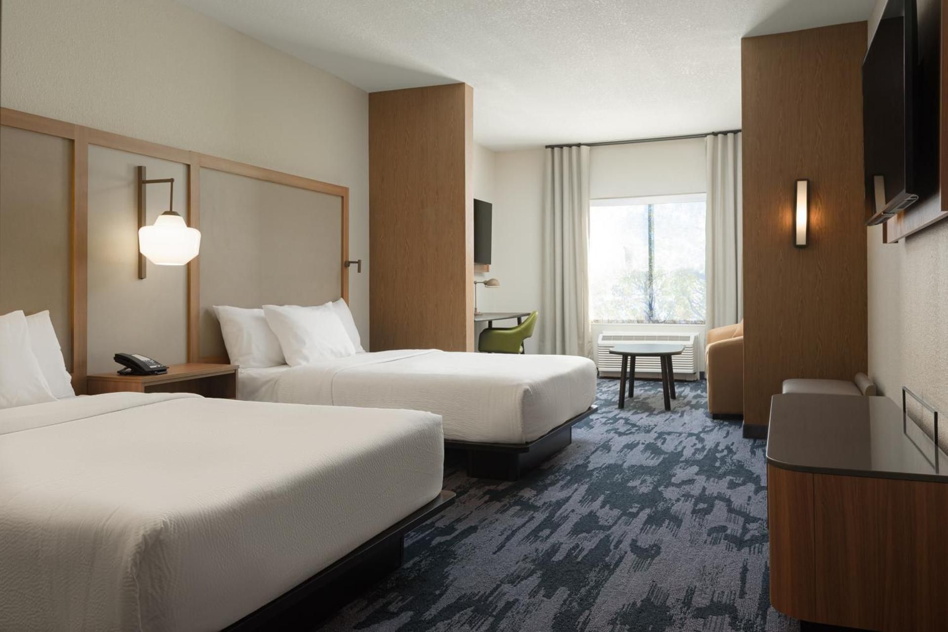 Deluxe Queen Room with Two Queen and One Sofa Bed
