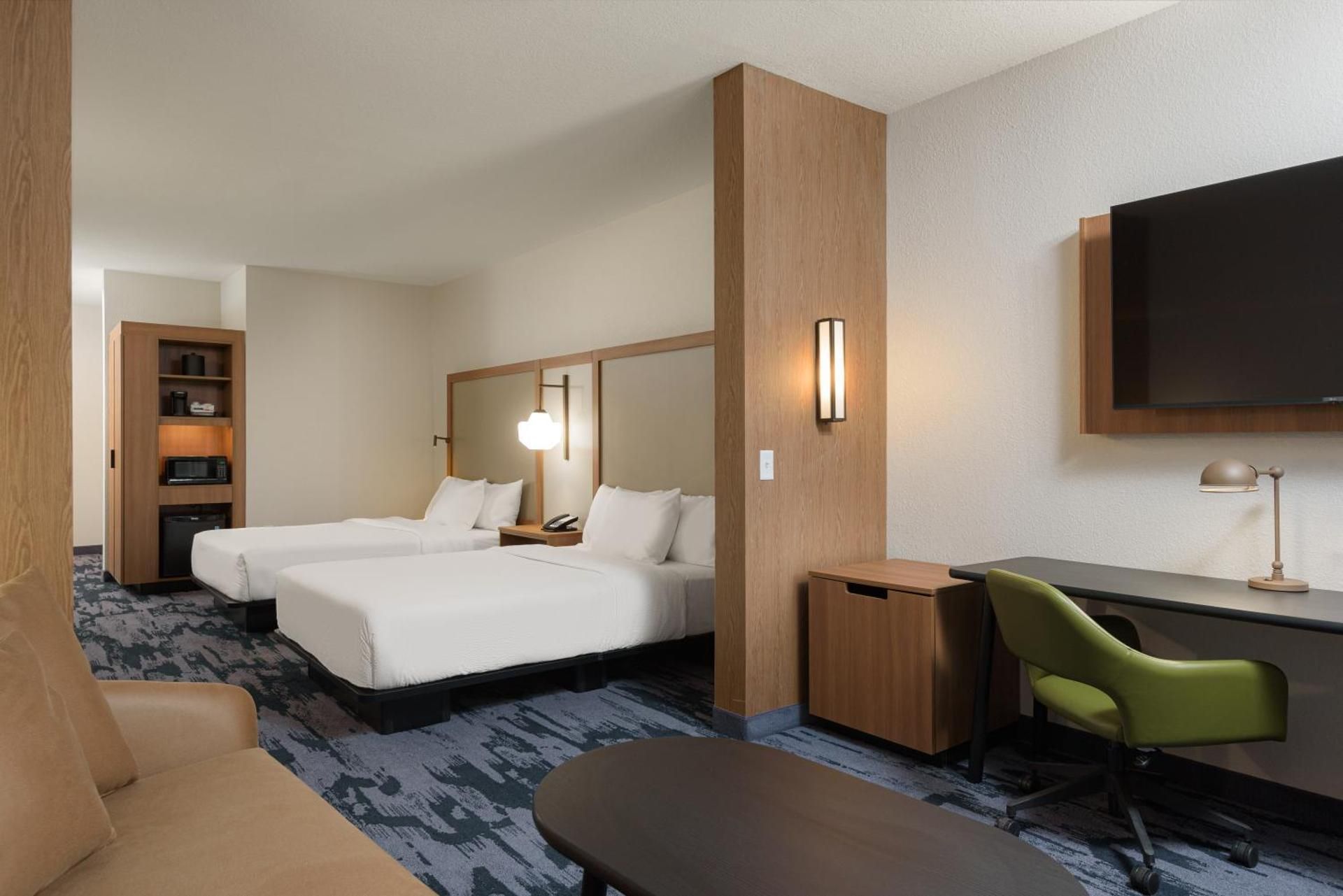 Deluxe Queen Room with Two Queen and One Sofa Bed