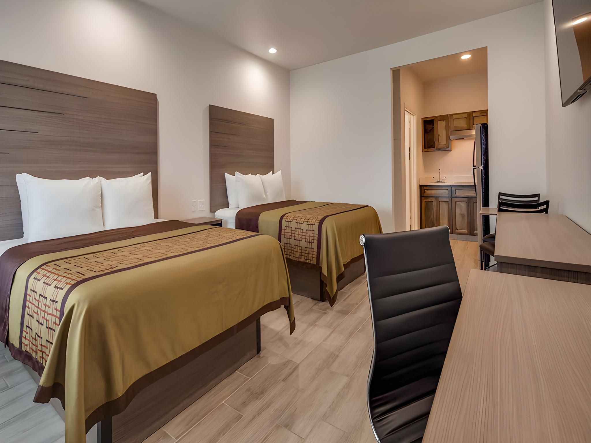 Suite-2 Queen Beds, Non-Smoking, Kitchenette, Microwave, Full Refrigerator, Continental Breakfast