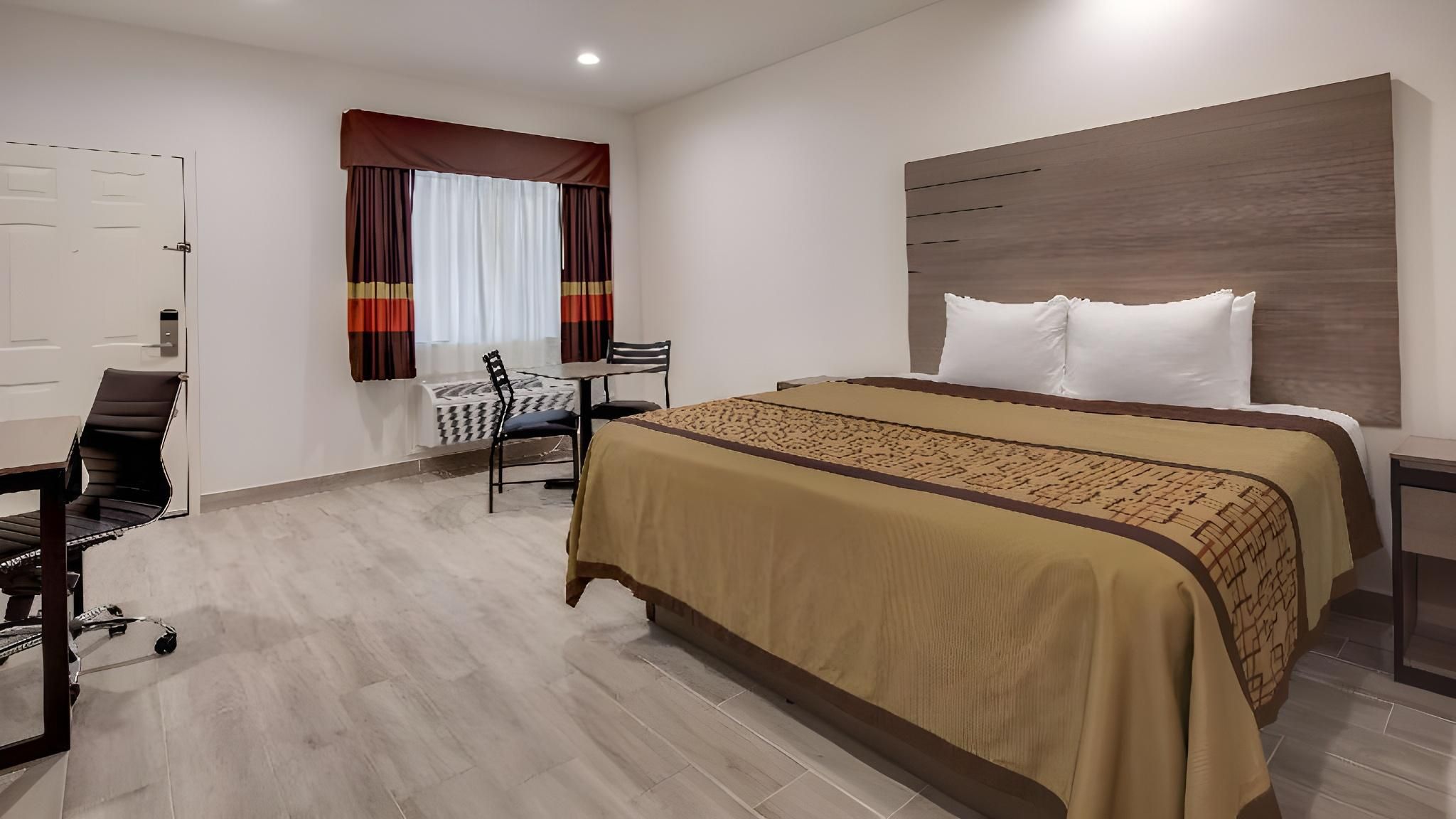 Suite-1 King Bed, Non-Smoking, Kitchenette, Microwave, Full Refrigerator, Continental Breakfast