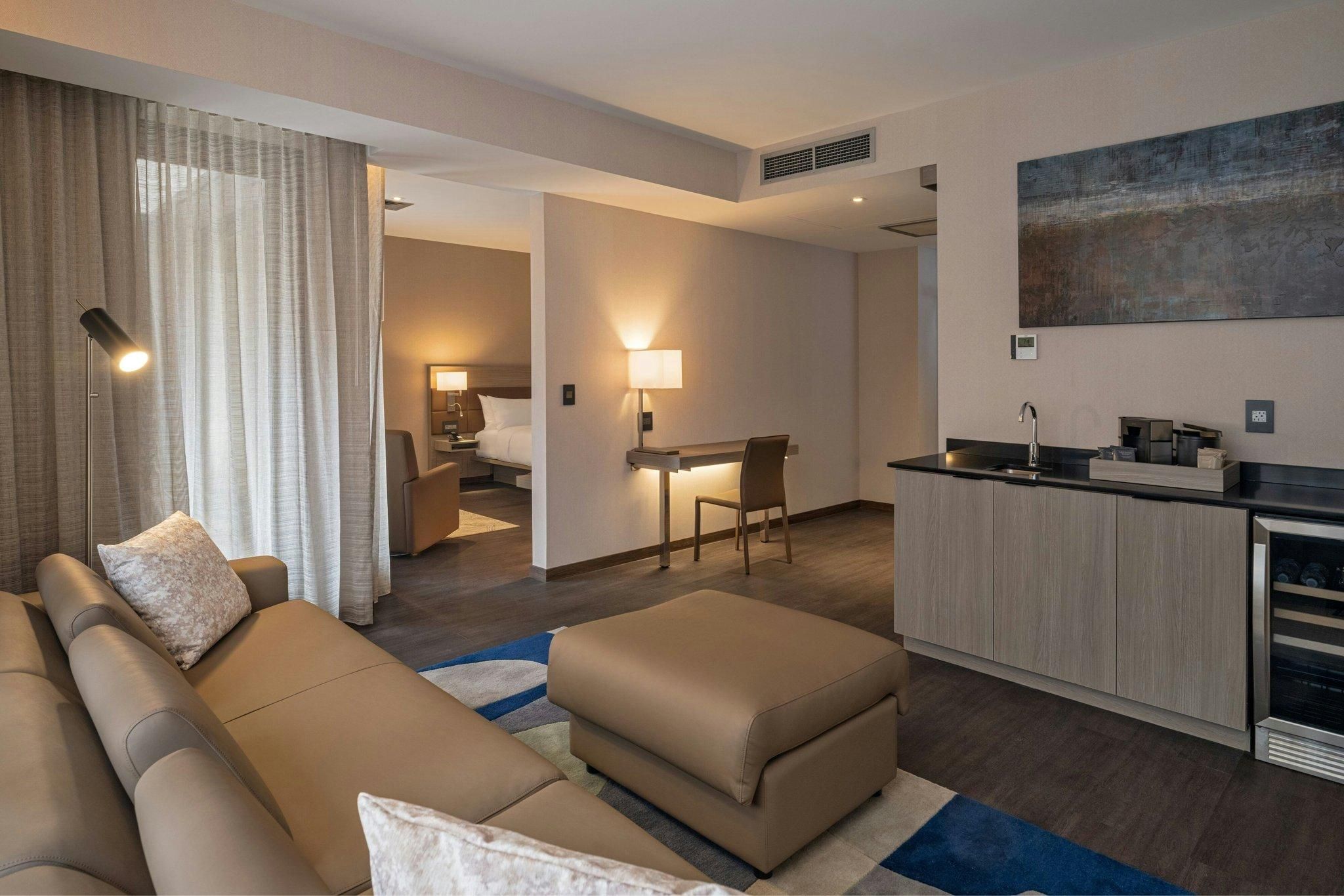 AC Hotel Wichita Downtown king suite, suite, 1 king, sofa bed, city view 3