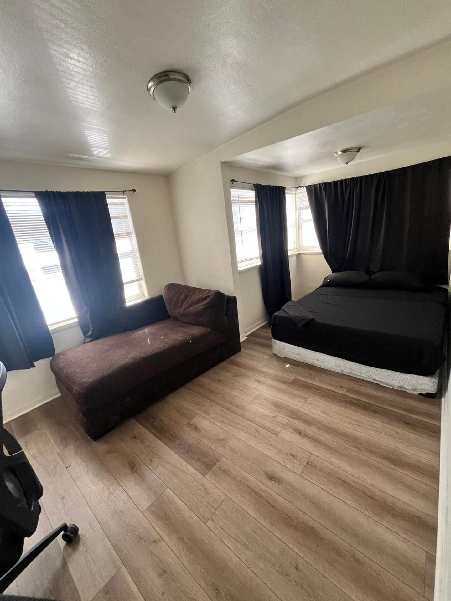 Queen Room with Shared Bathroom