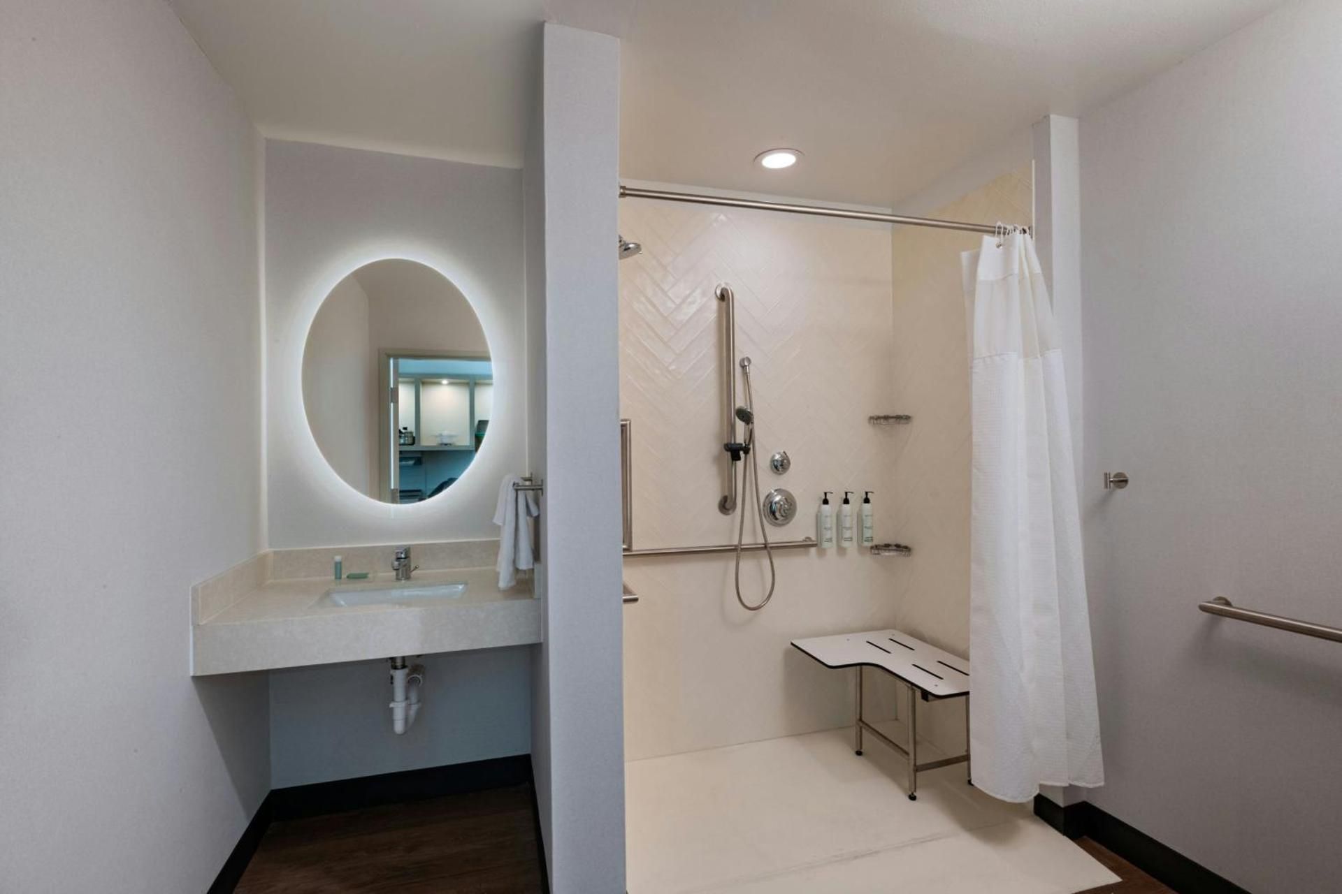 One-Bedroom King Suite with Sofa Bed - Mobility and Hearing Accessible with Roll-in Shower