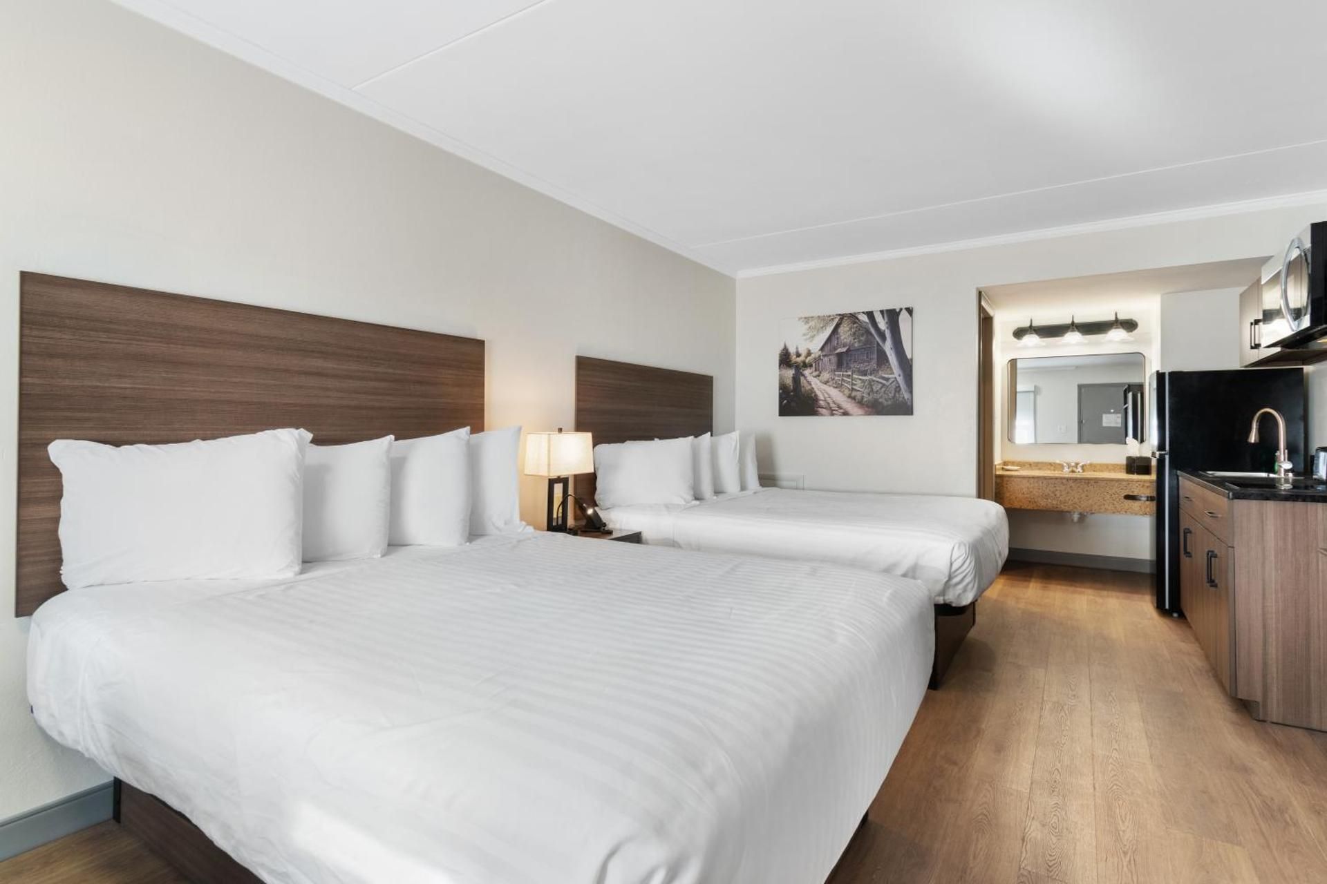 Queen Room with Two Queen Beds, Kitchenette and Dining Area - Non-Smoking/First Floor