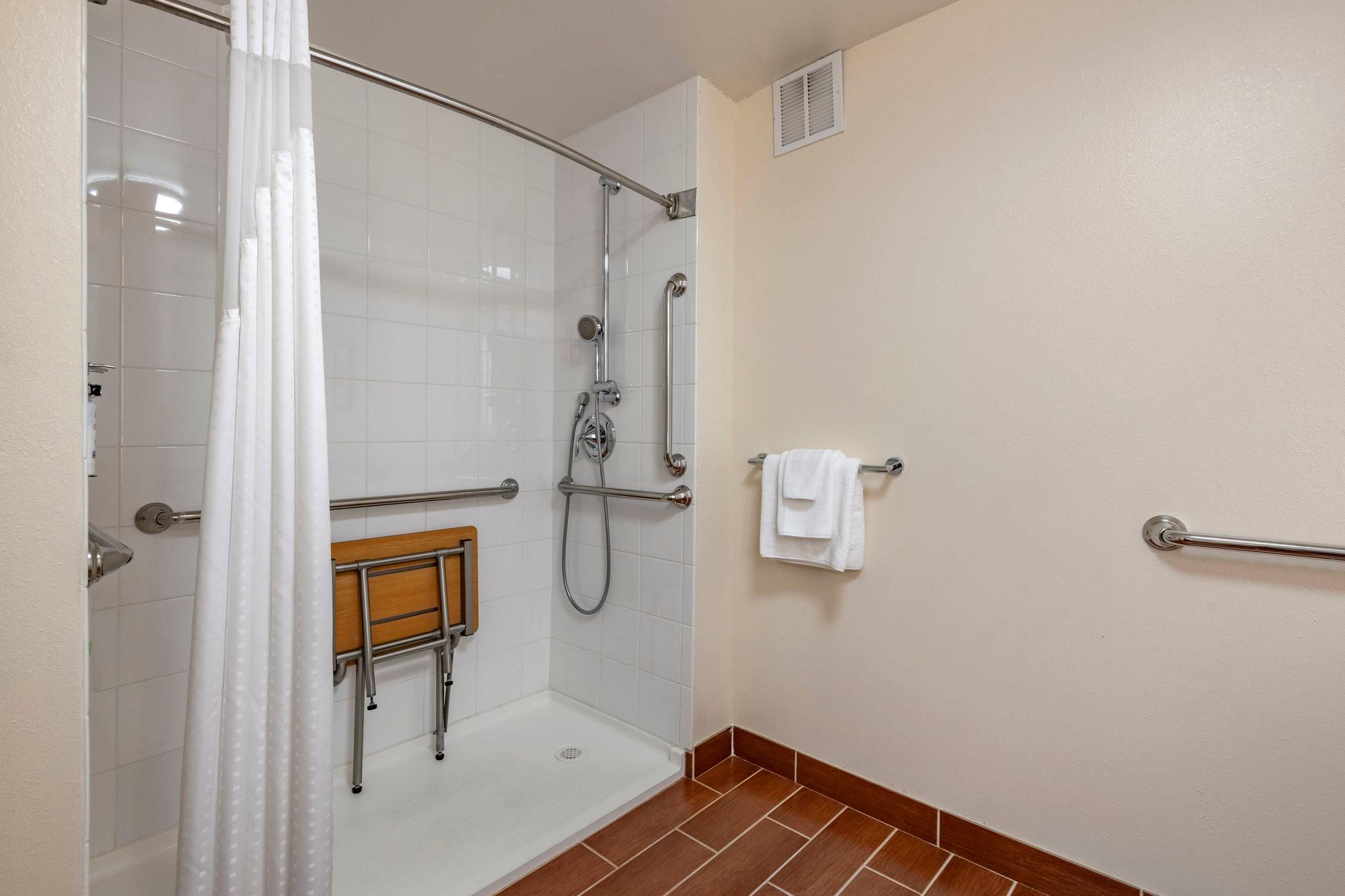 1 King Bed Standard Communication Accessible Roll Shower