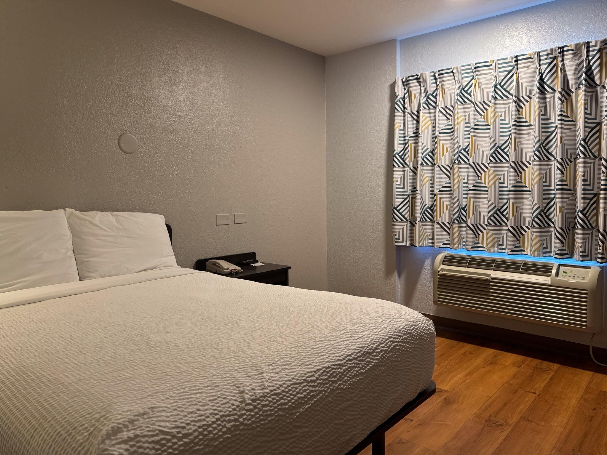 1 Full Bed | ADA/RI Shower/Mini Fridge