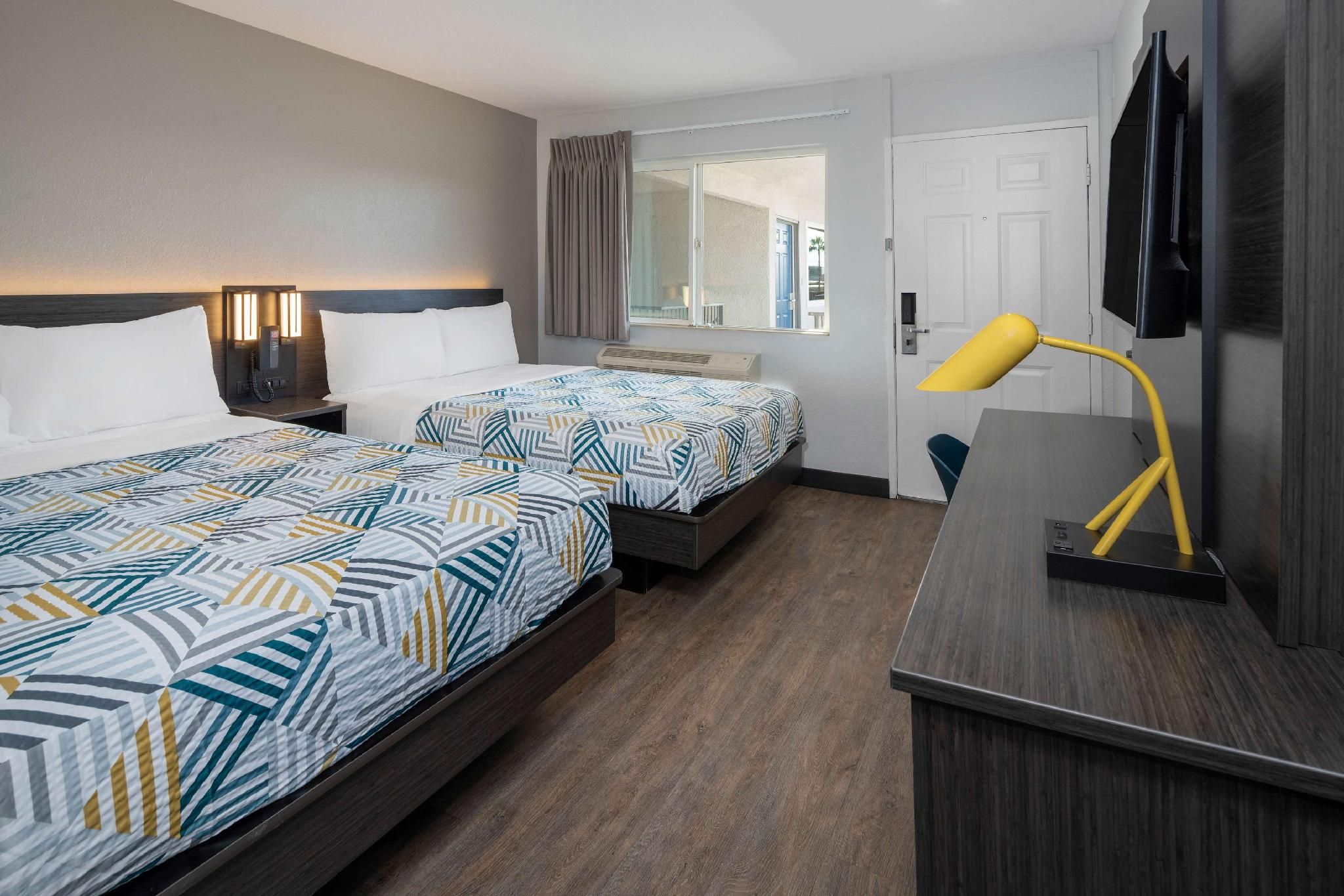 2 Full Beds | Mini Fridge