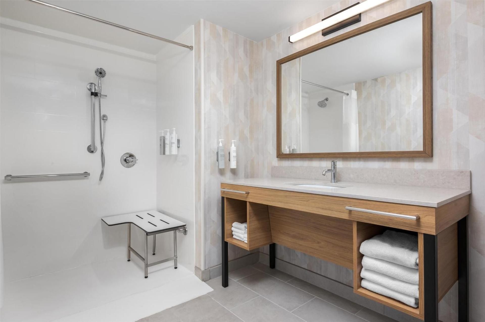 1 KING MOBILITY ACCESS ROLL IN SHOWER