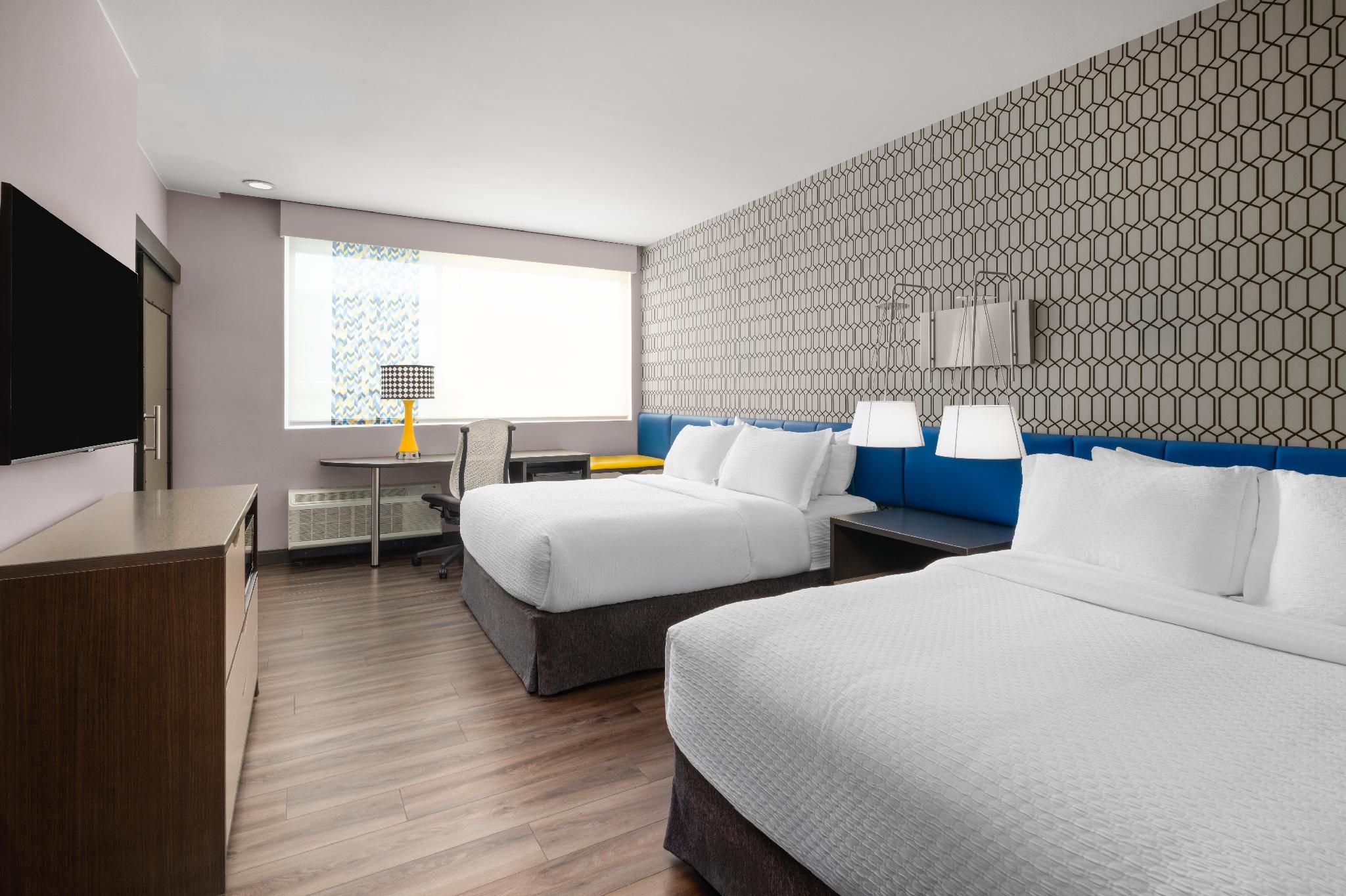 GLō Best Western Enid OK Downtown/Convention Center Hotel accessible - 2 queen, mobility accessible, bathtub, signature gel top mattress, microwave and refrig