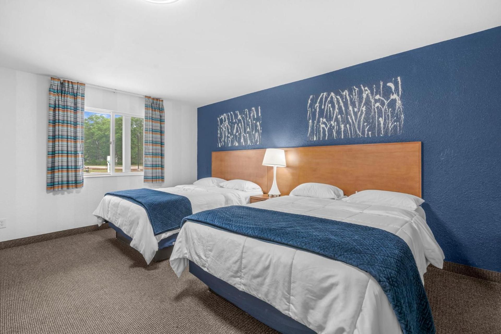 Starlite Resort Deluxe Queen Room with Two Queen Beds 2