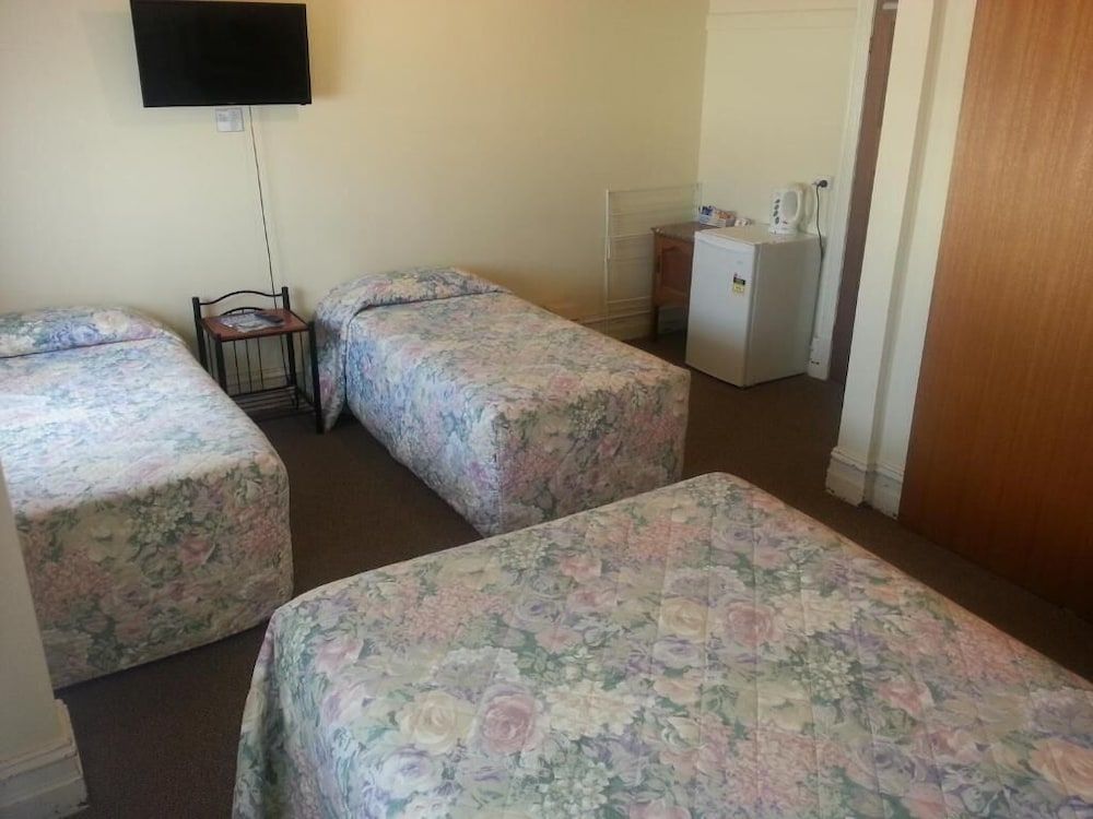 Family Quadruple Room, Multiple Beds, Non Smoking, Private Bathroom