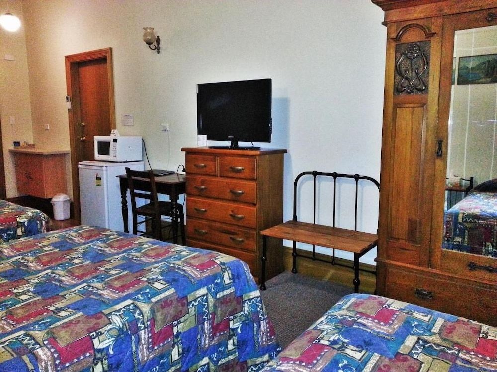 Deluxe Quadruple Room, Multiple Beds, Patio, Courtyard View