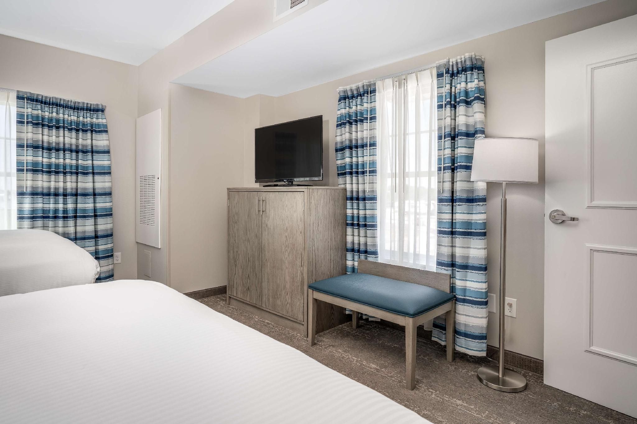 Lighthouse Suites, BW Signature Collection Suite - 2 Queen Beds, Nonsmoking, Separate Bedroom, Living Room, Sofa, Chair 2