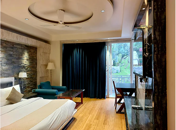 Deluxe Room With Balcony (Garden View )